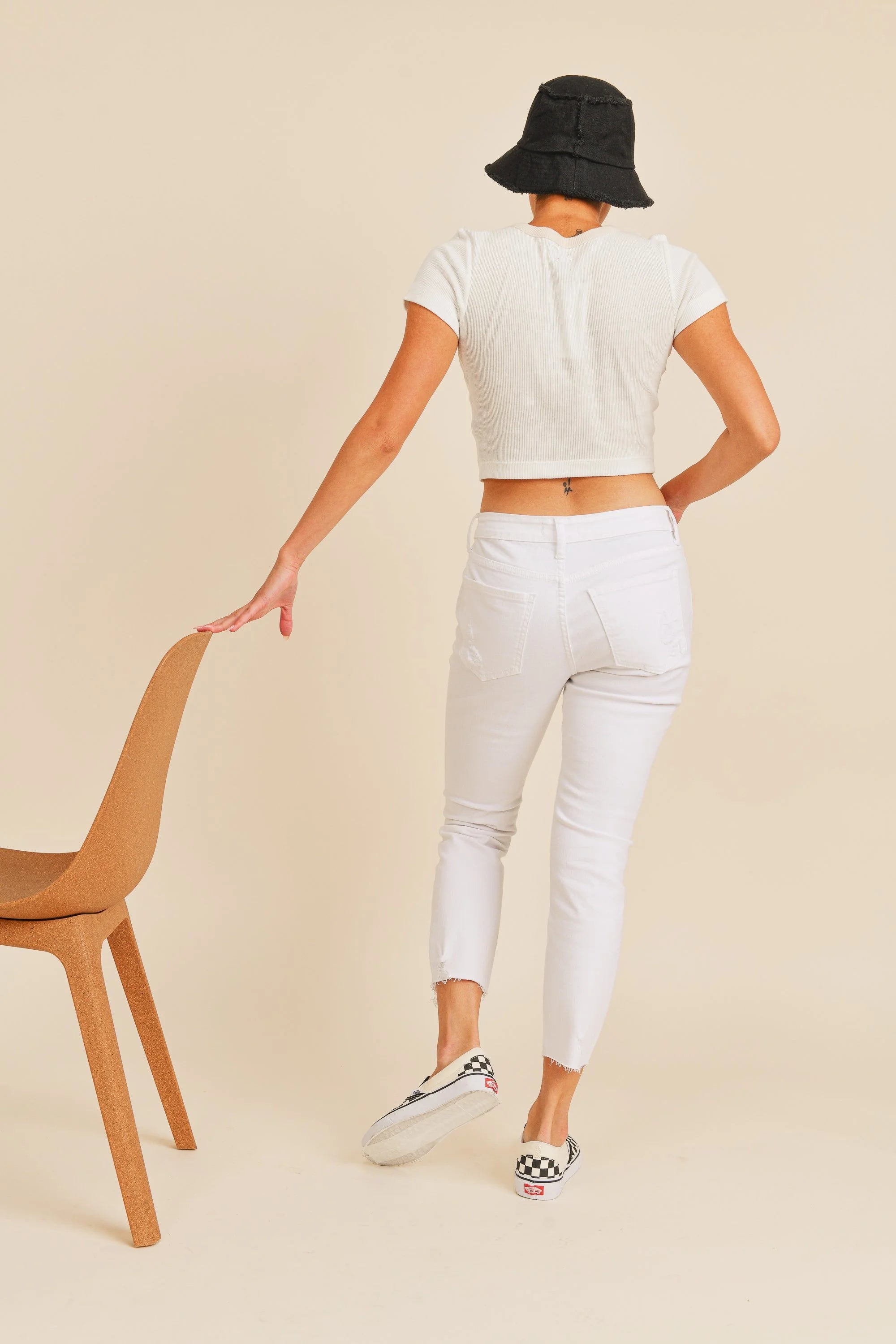Woman modeling denim.