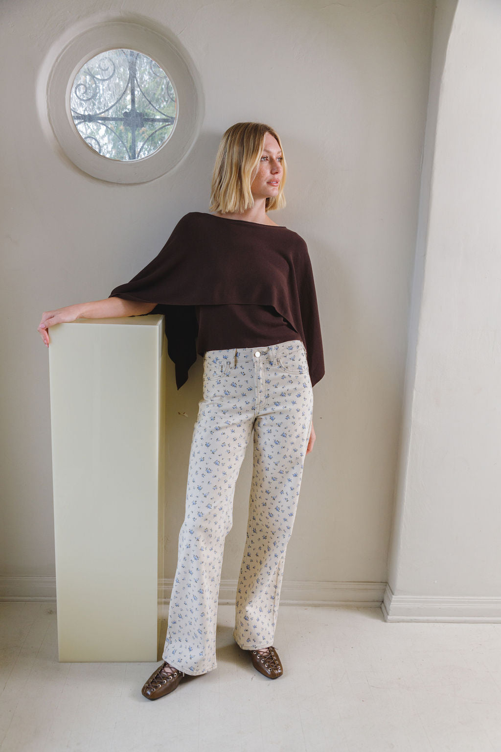 Woman modeling denim.