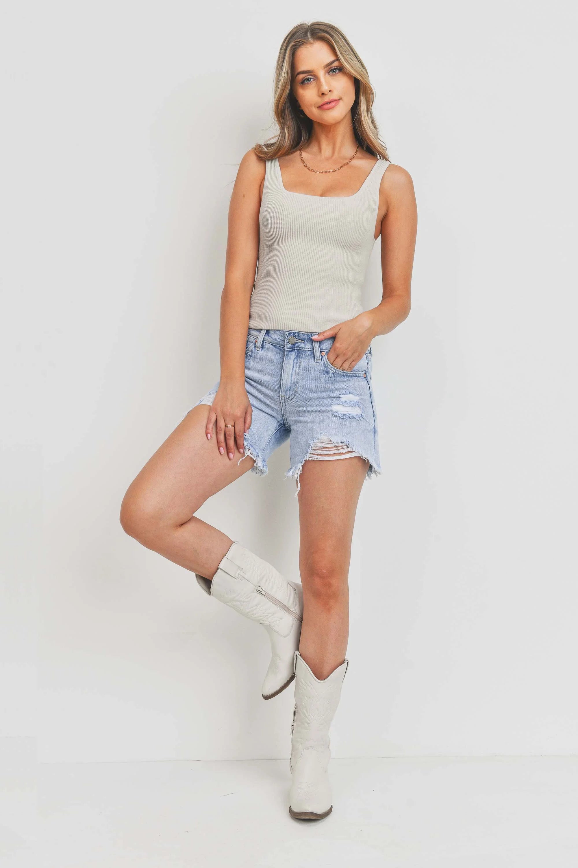Woman modeling denim.