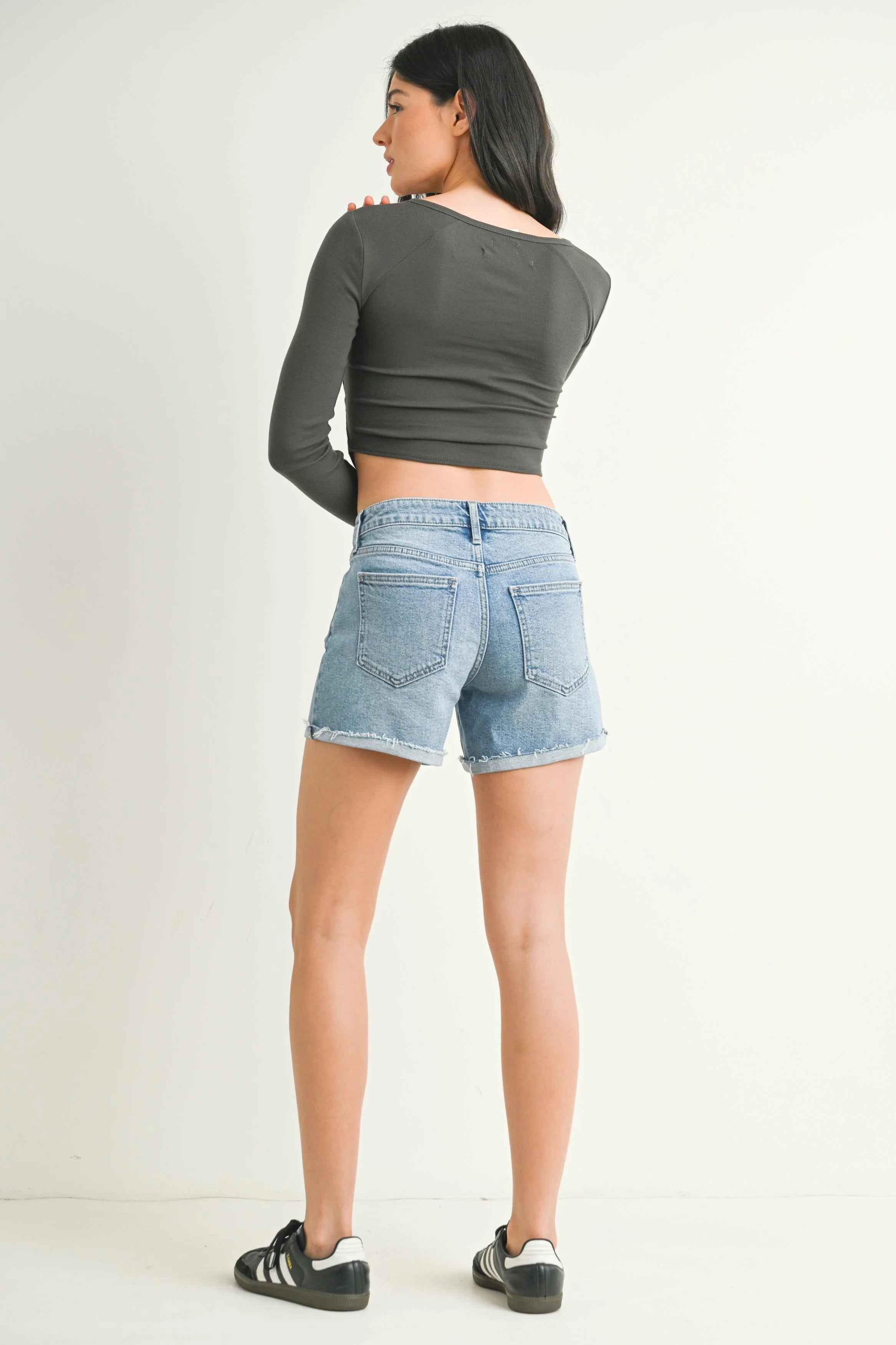 Woman modeling denim.