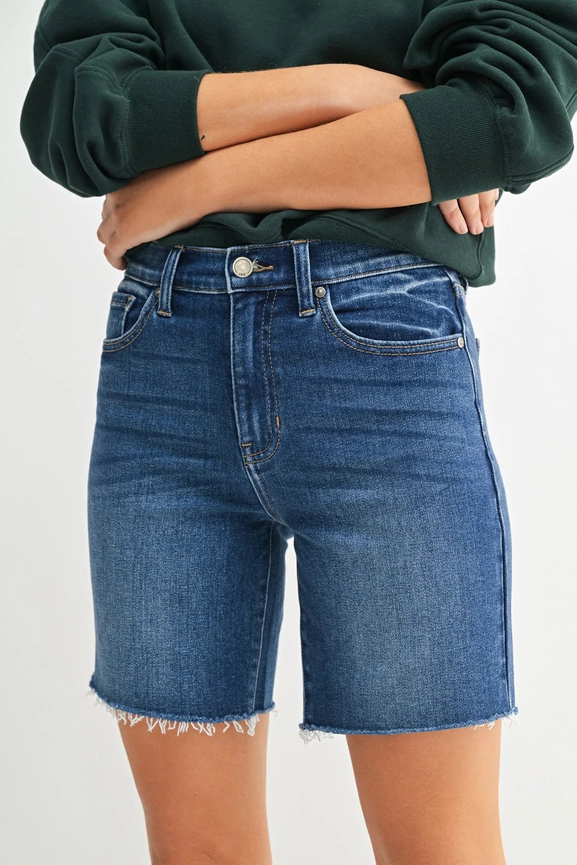 Woman modeling denim.
