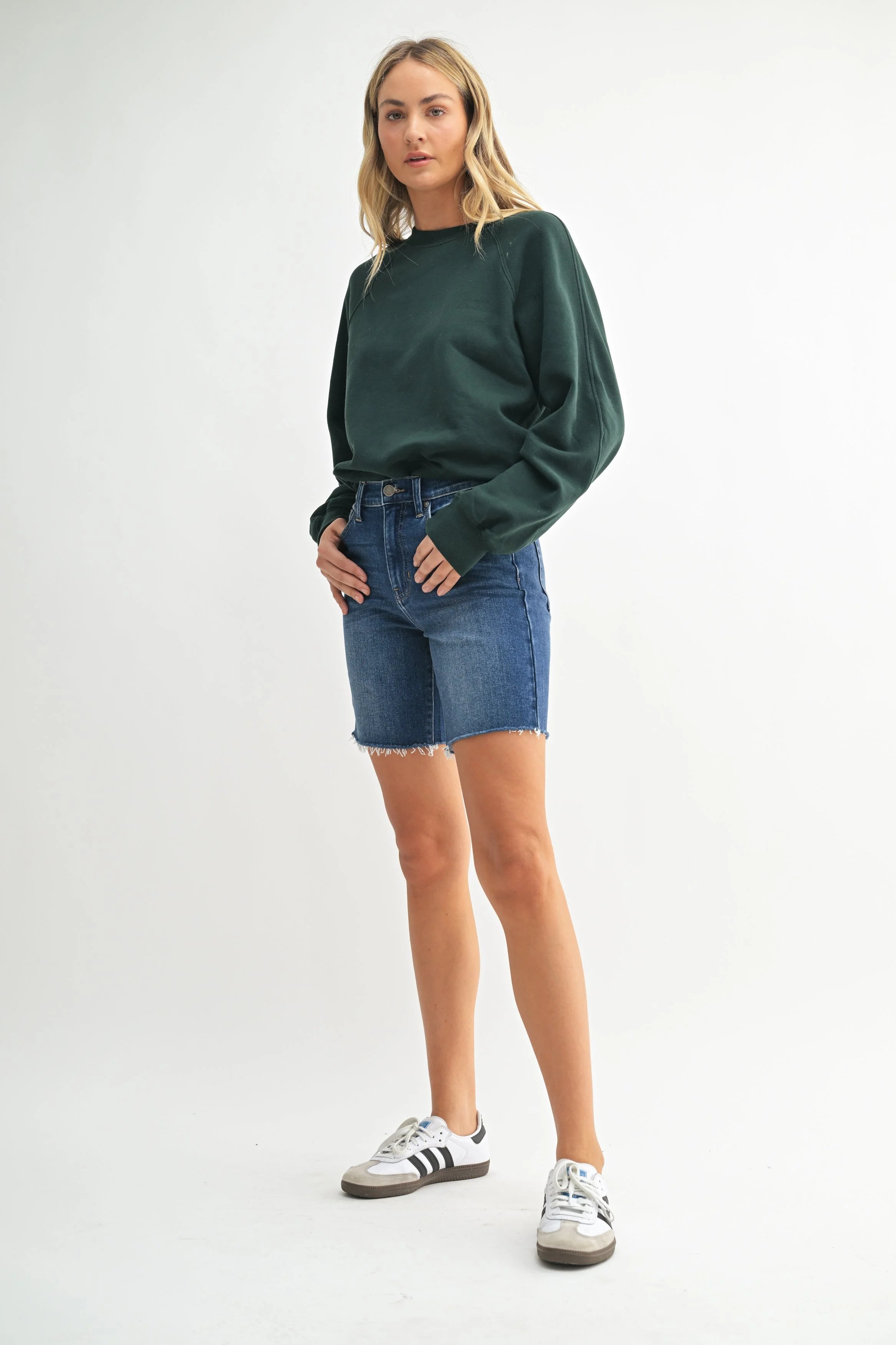 Woman modeling denim.