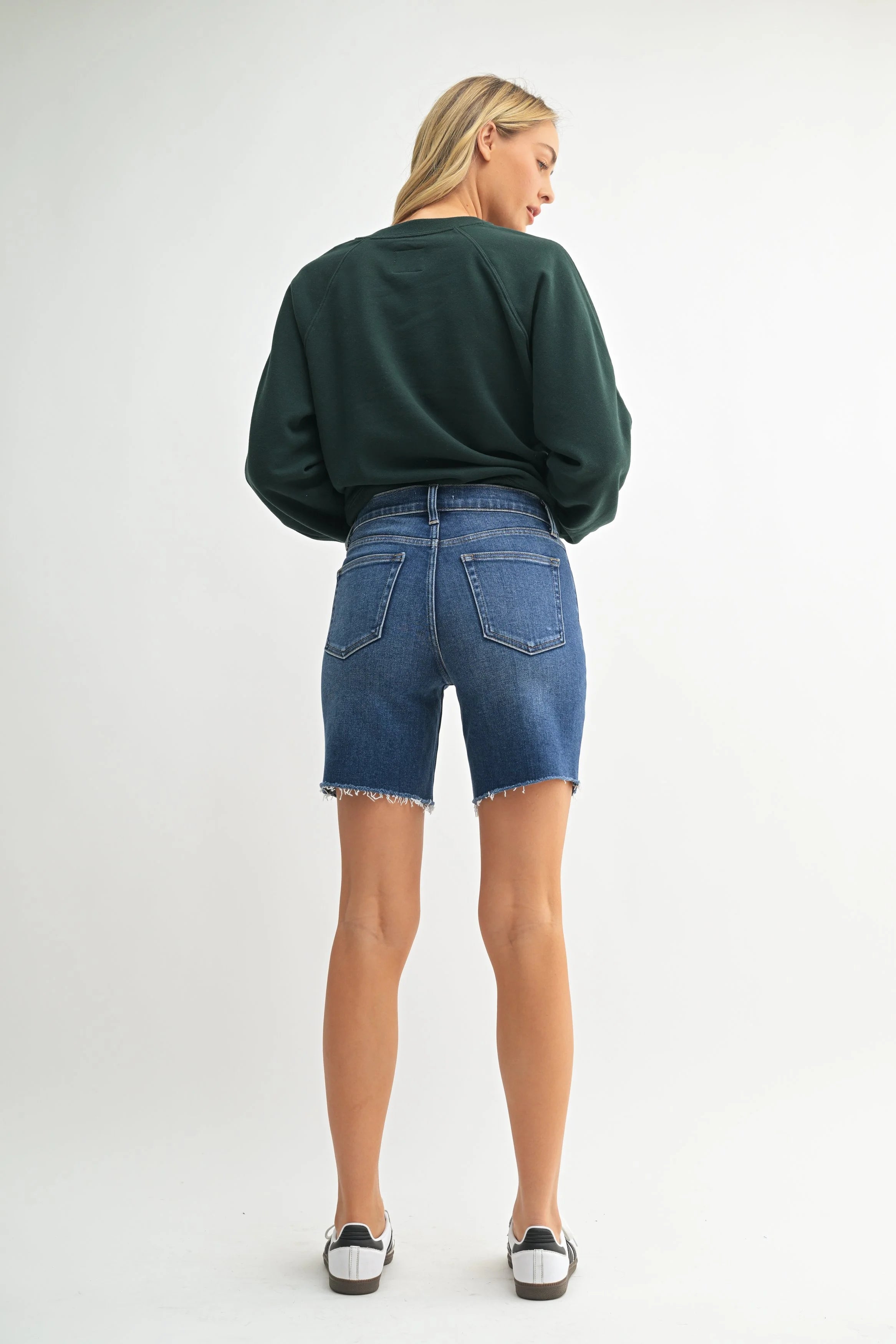 Woman modeling denim.