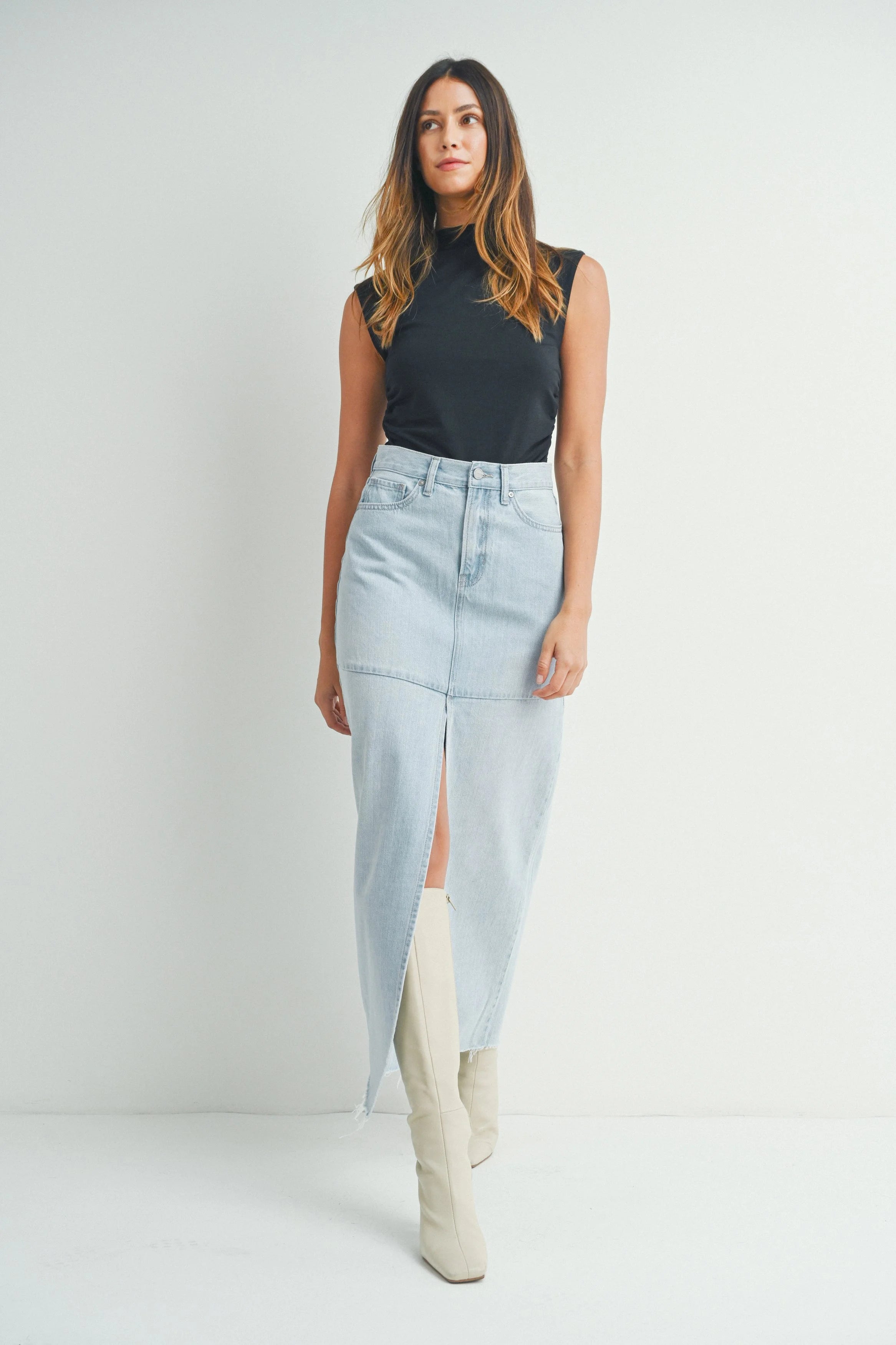 Woman modeling denim.