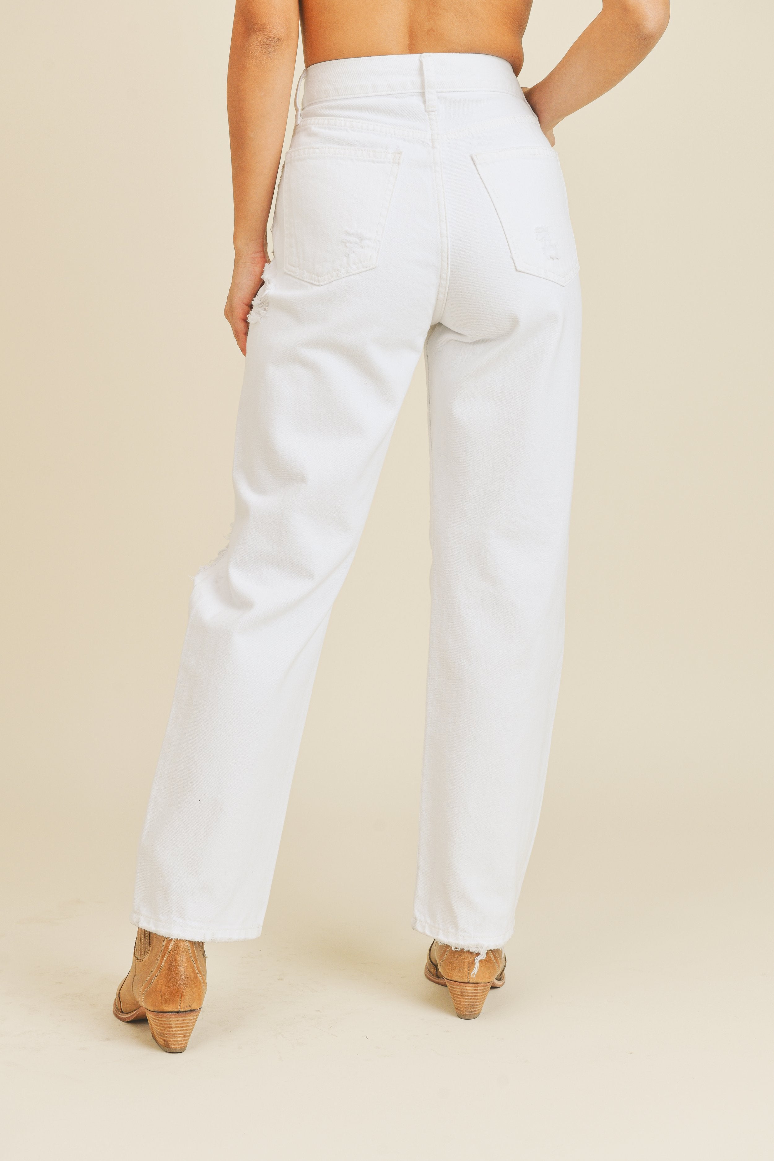 Woman modeling denim.