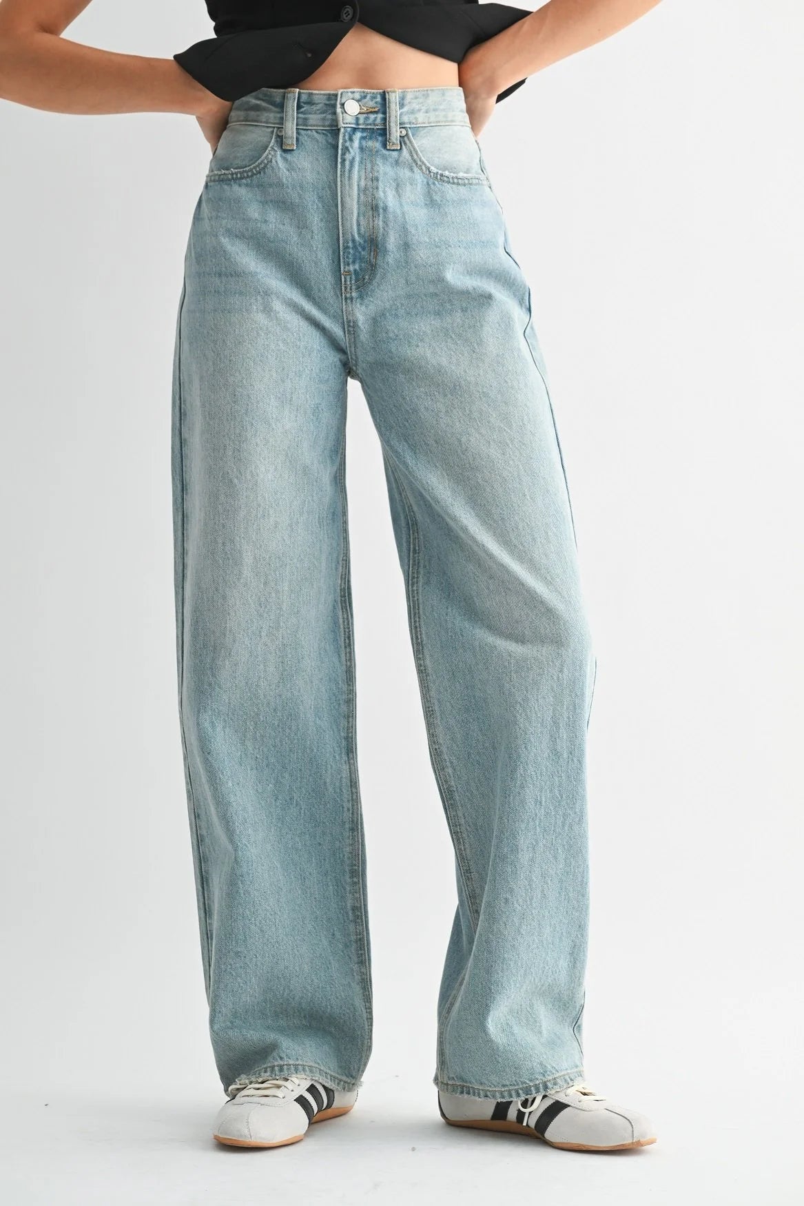 Woman modeling denim.