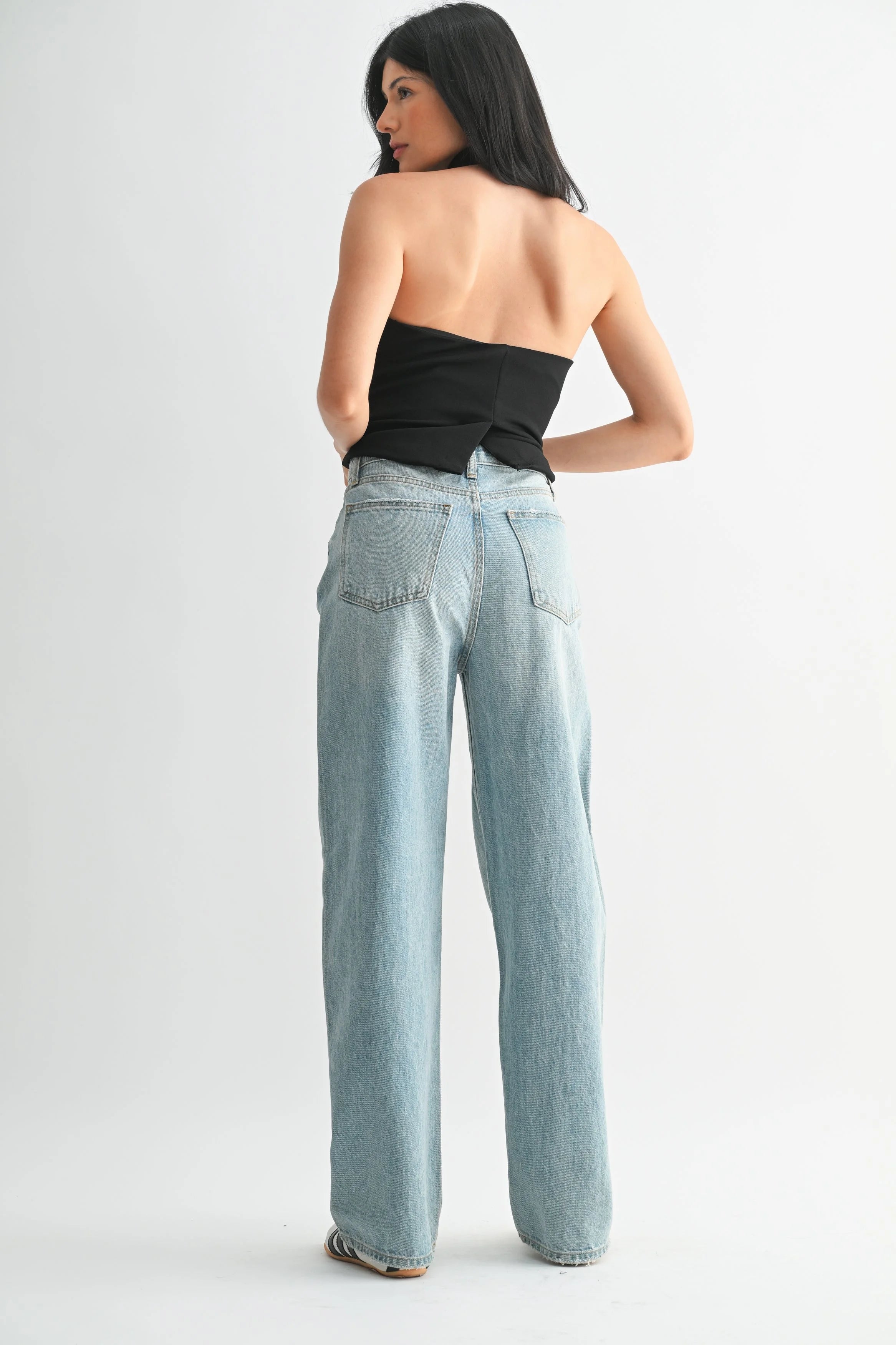 Woman modeling denim.