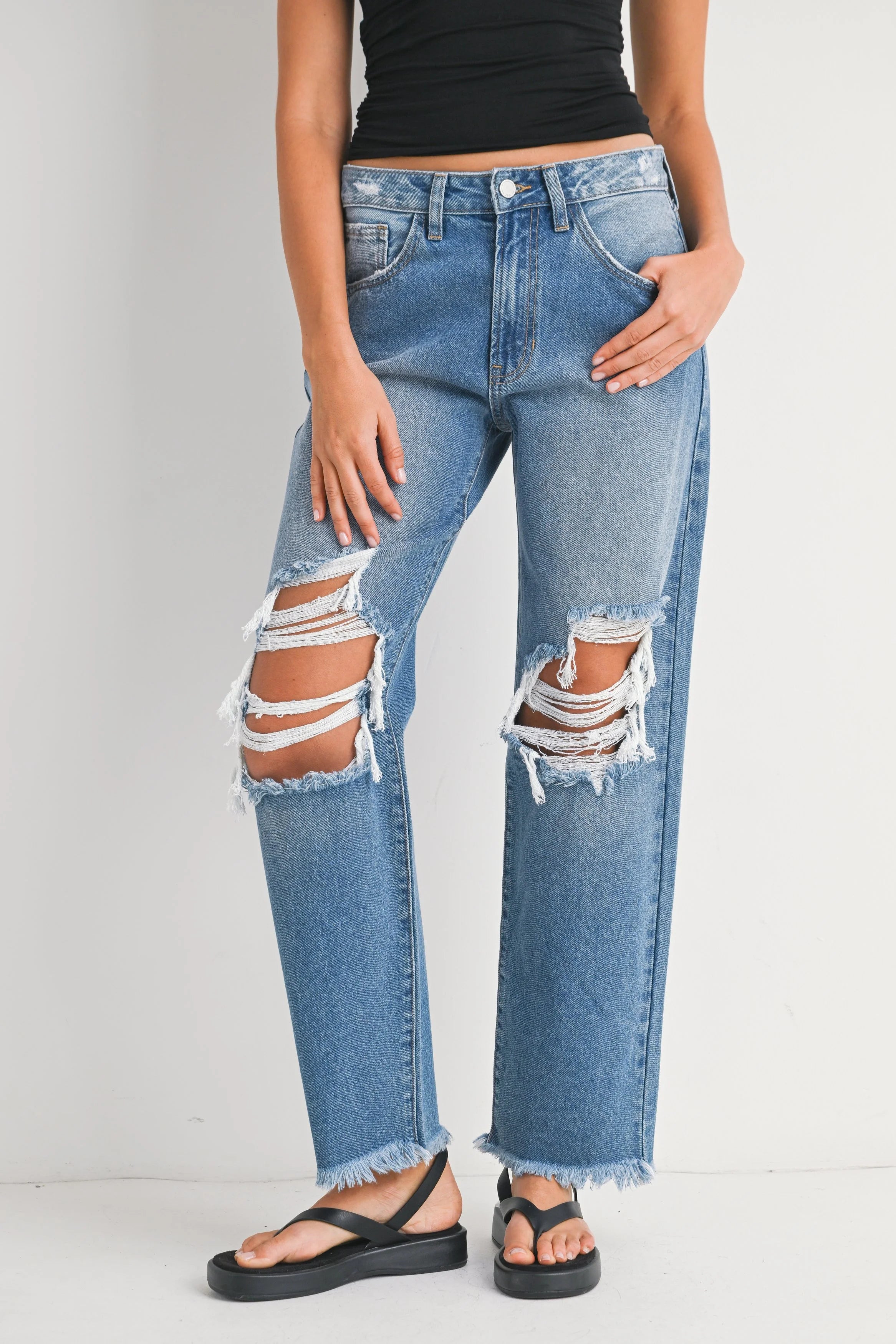 Woman modeling denim.