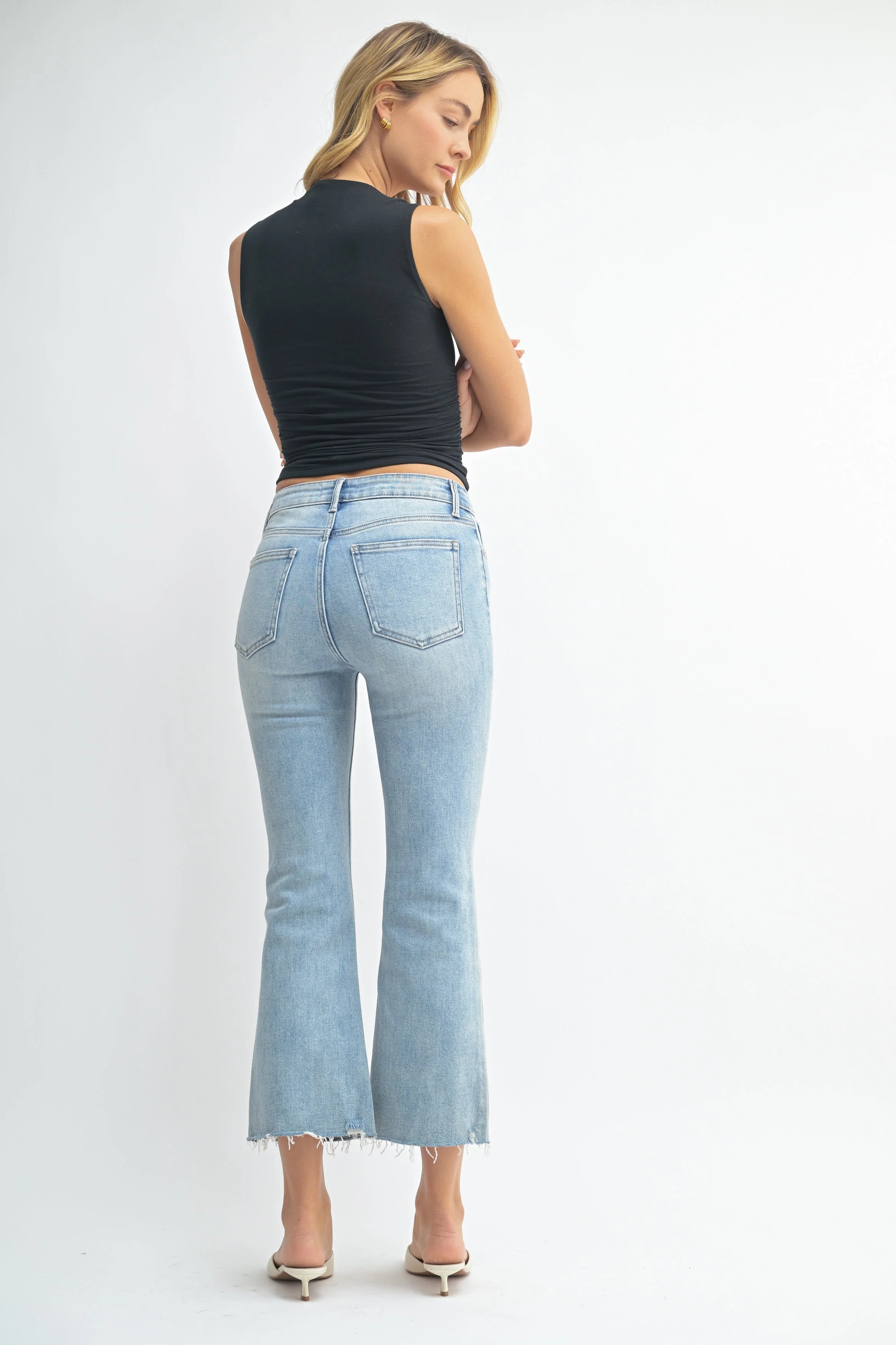 Woman modeling denim.