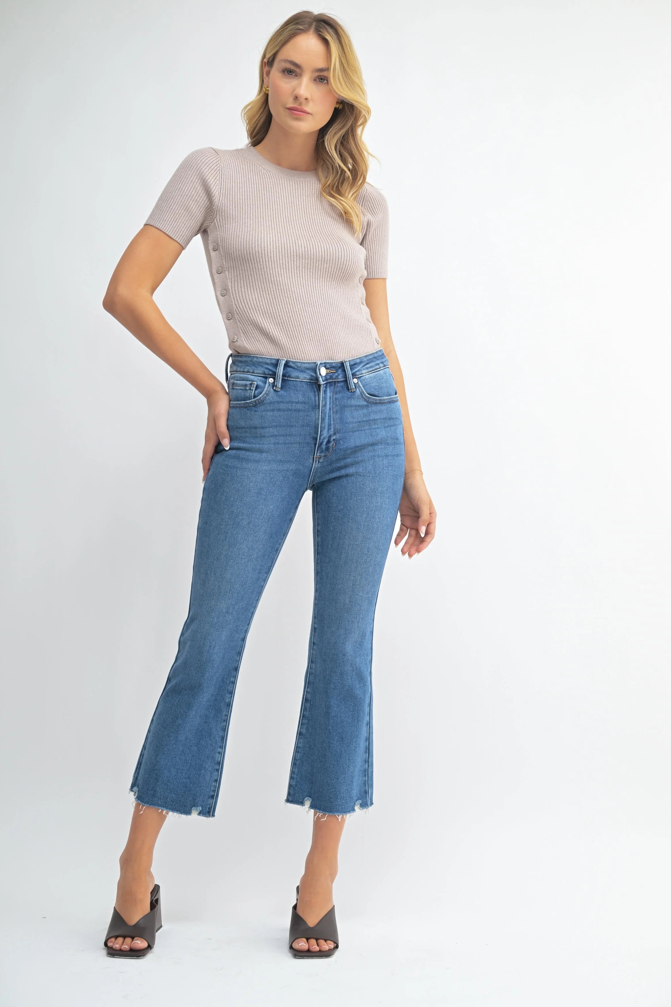 Woman modeling denim.