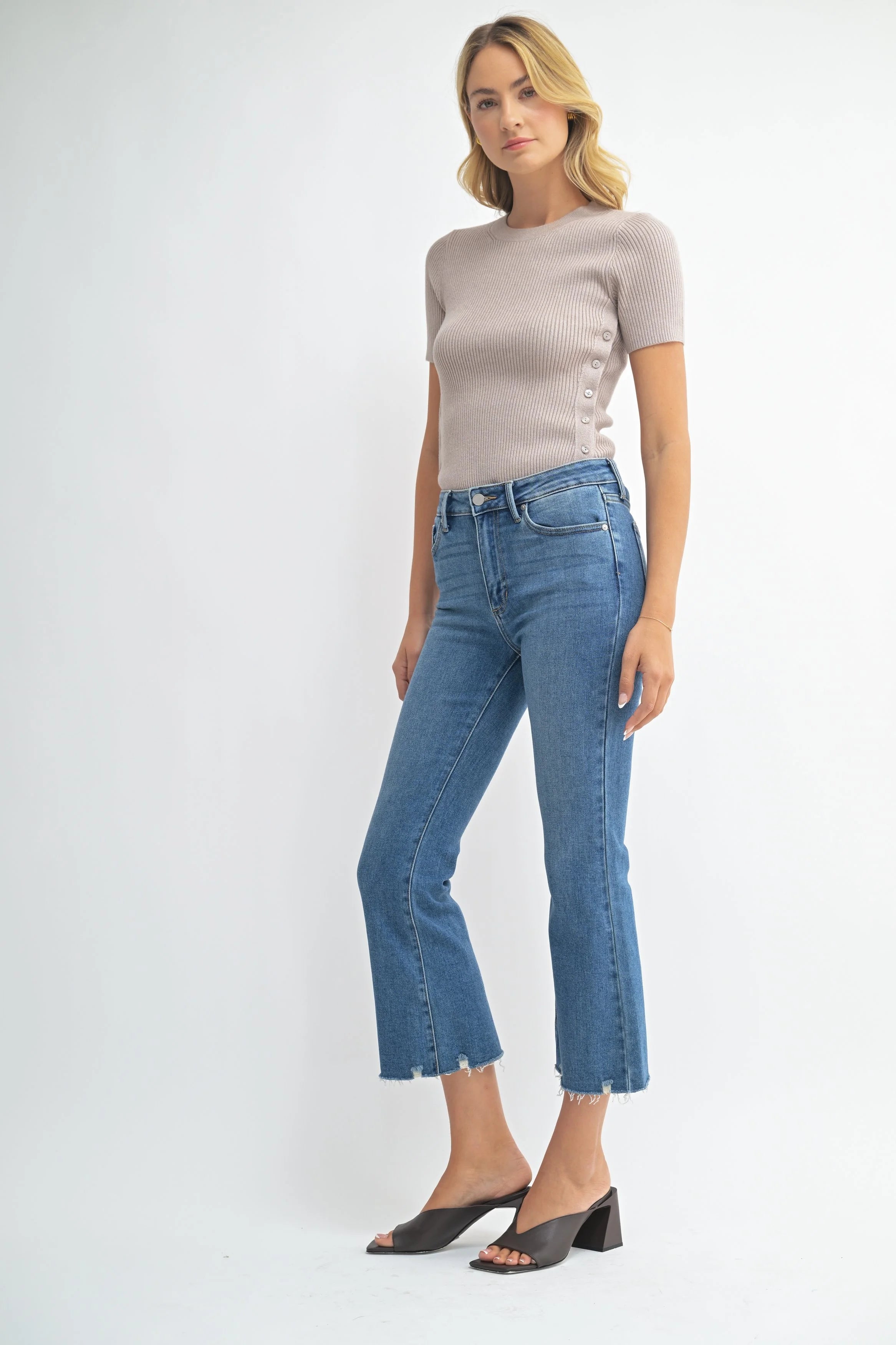 Woman modeling denim.