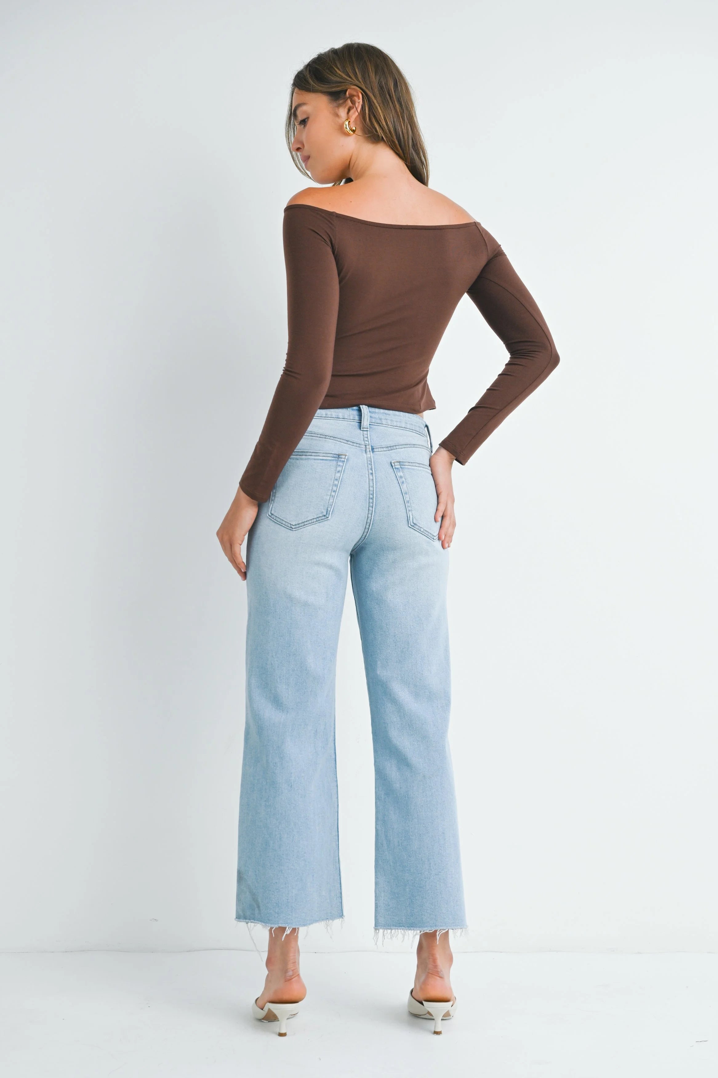 Woman modeling denim.