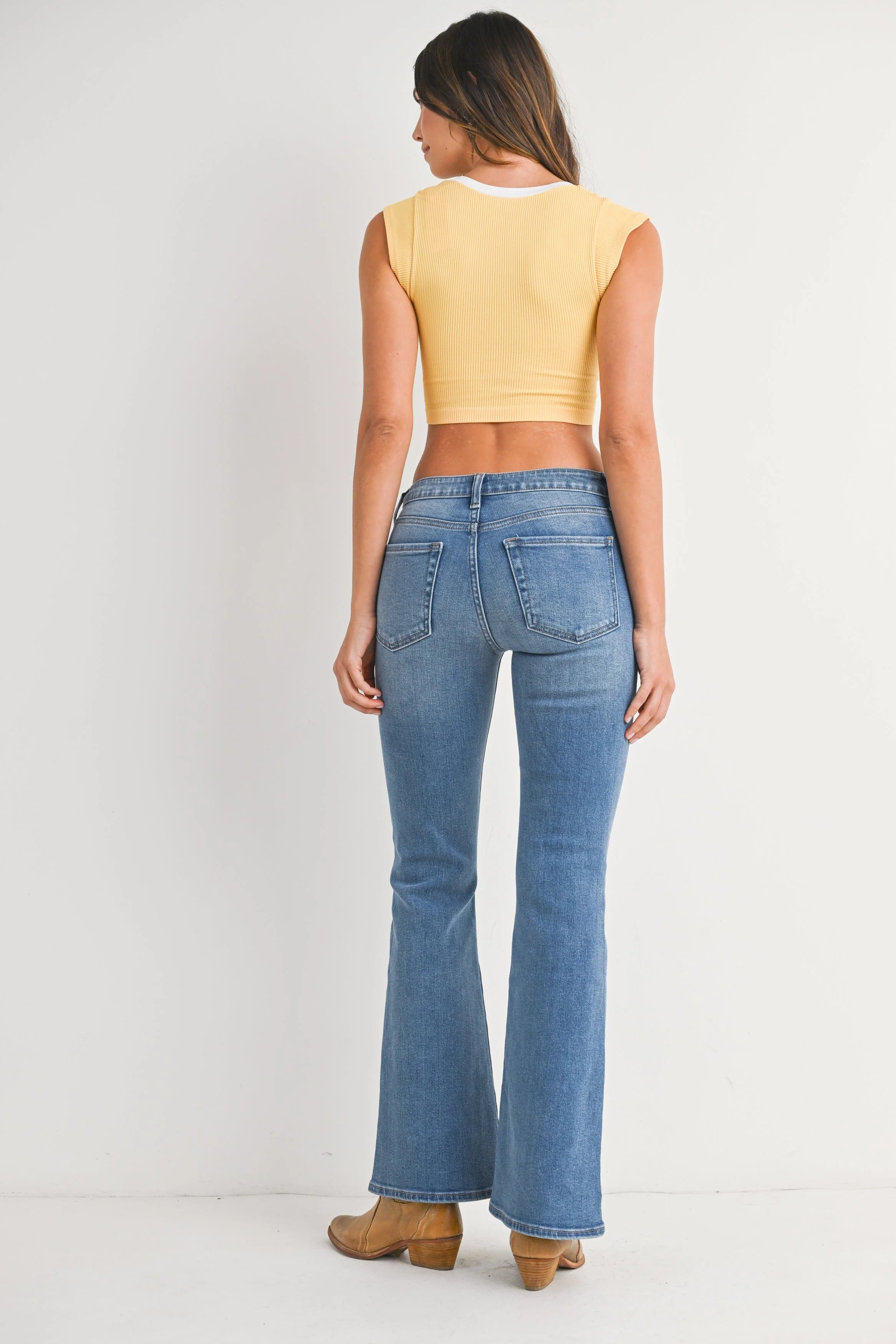 Woman modeling denim.