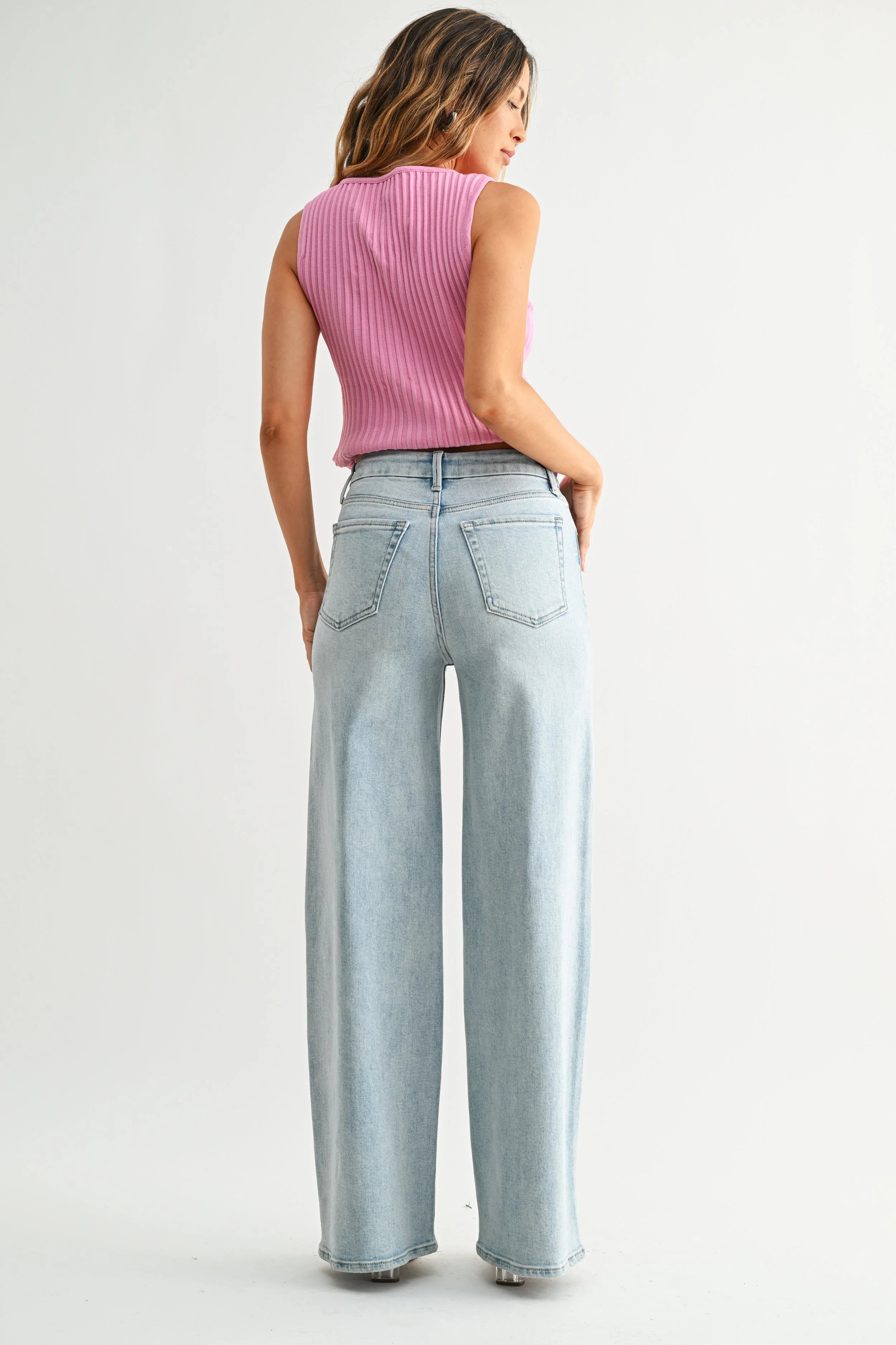 Woman modeling denim.