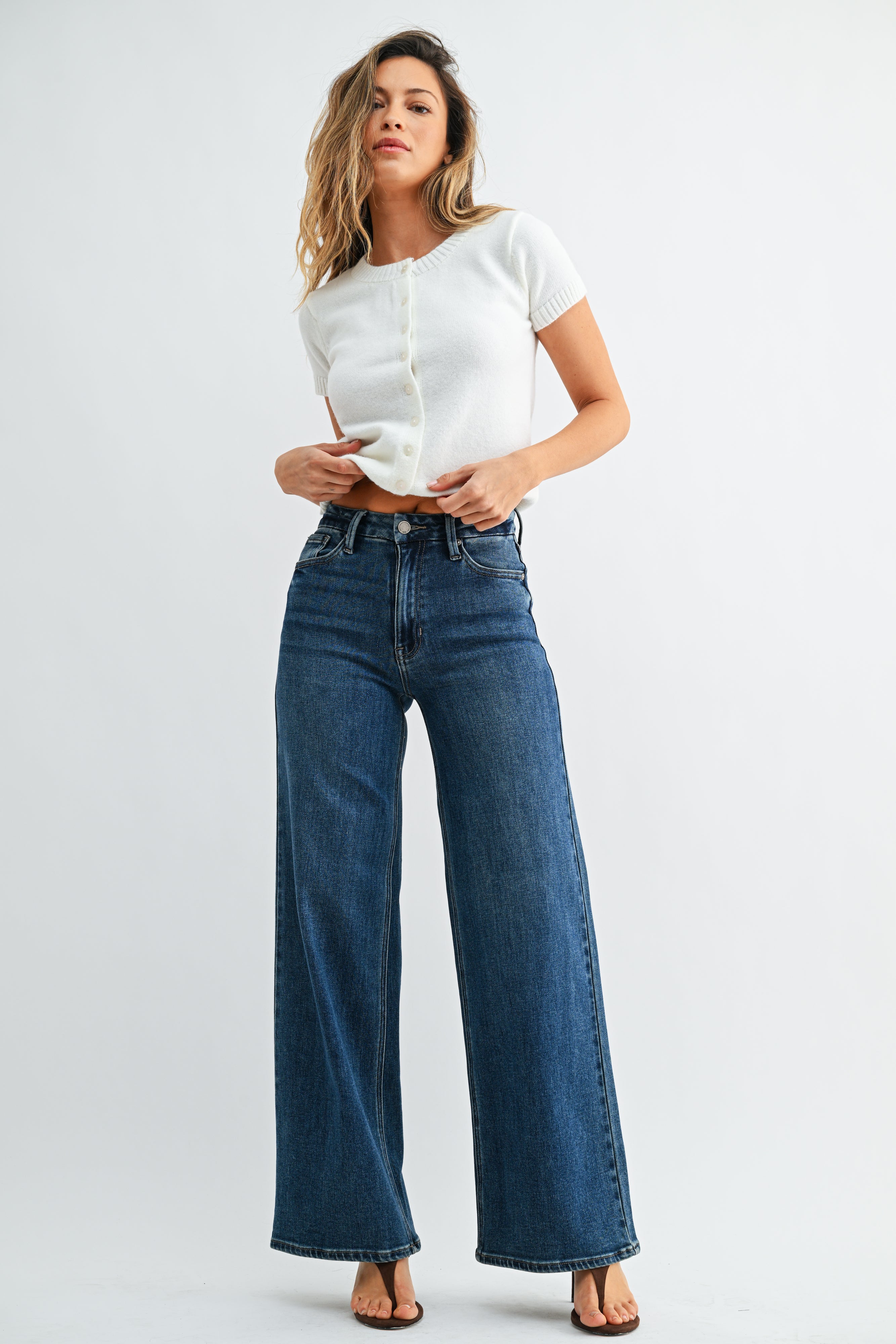 Woman modeling denim.