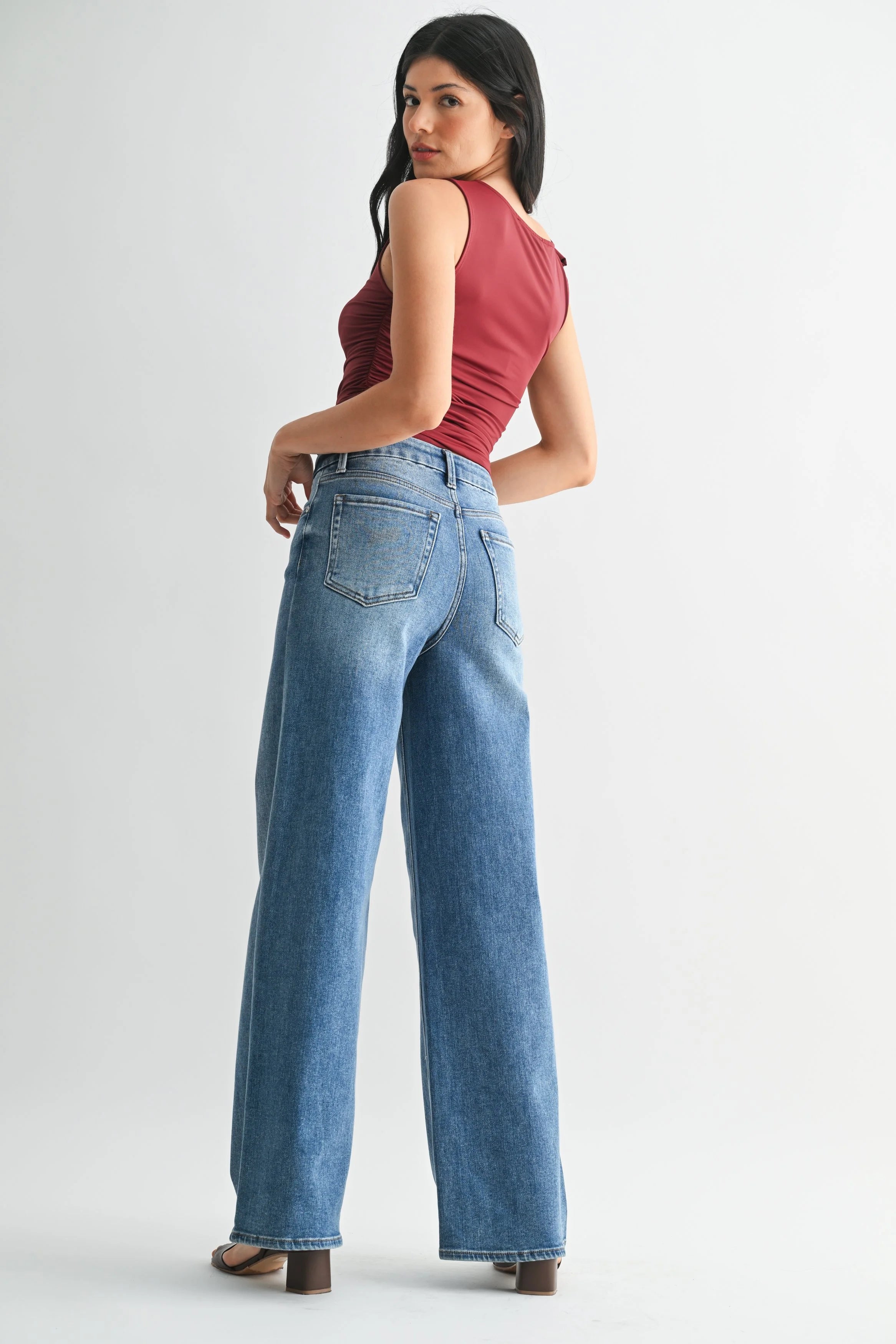 Woman modeling denim.
