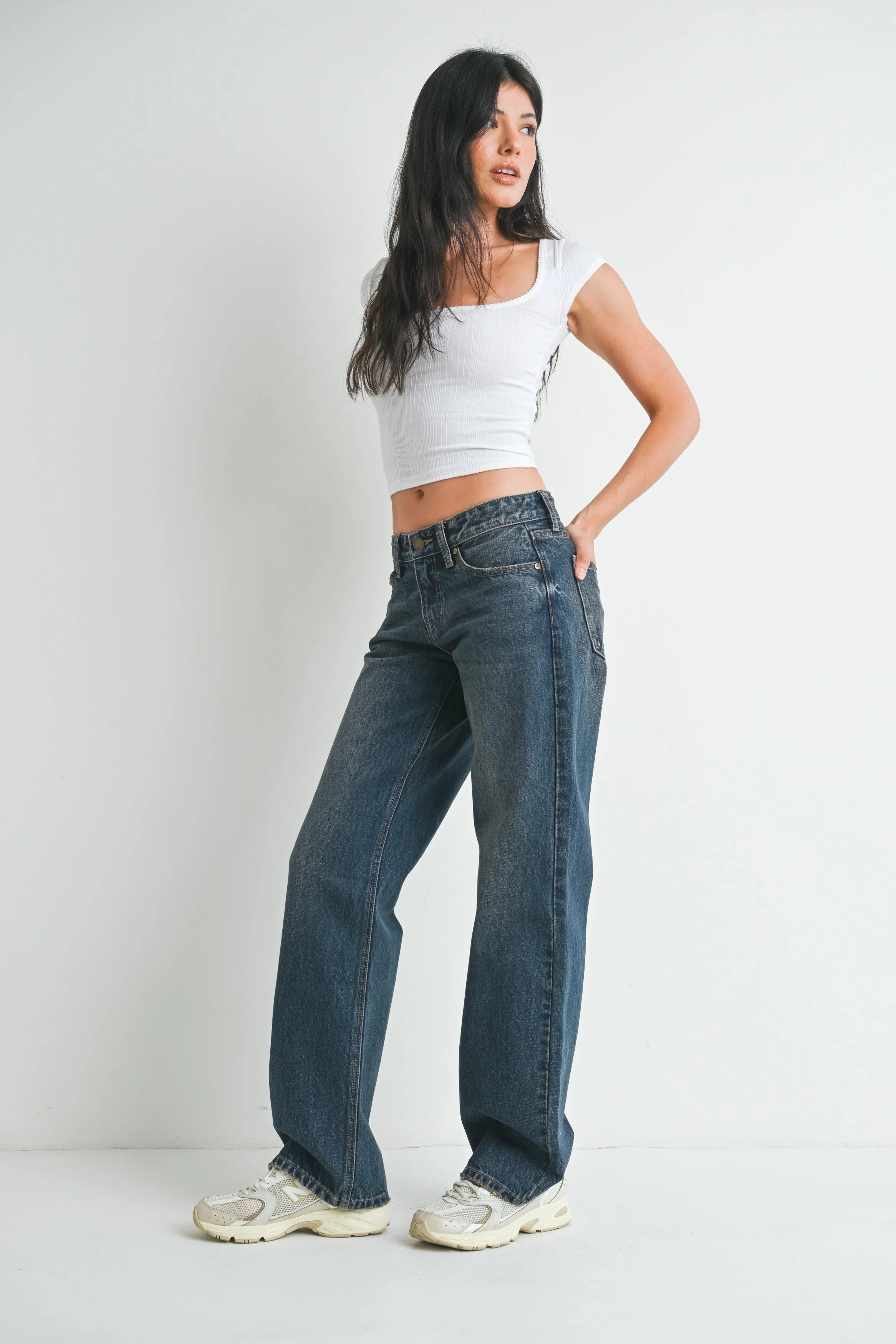 Woman modeling denim.