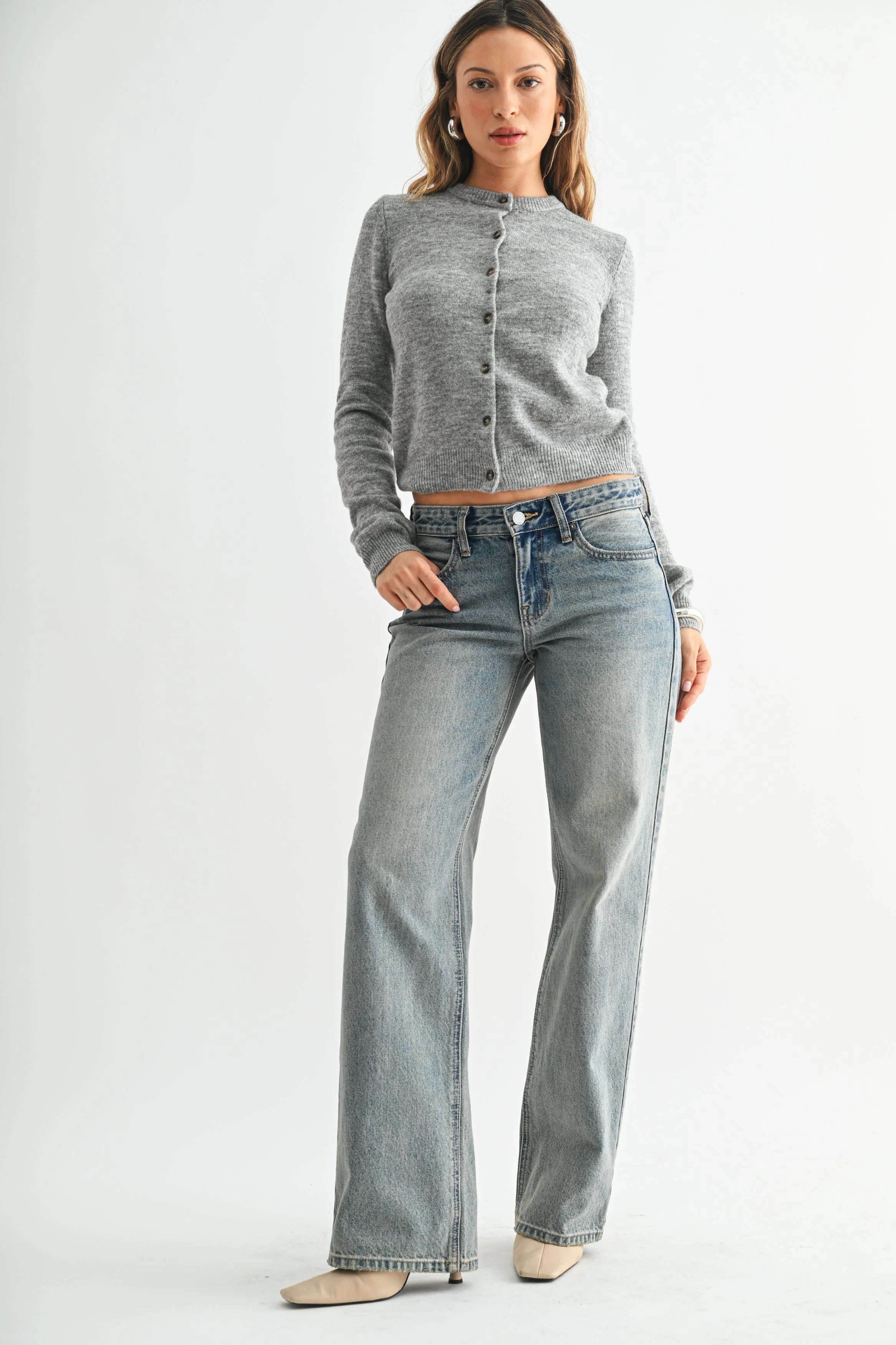 Woman modeling denim.