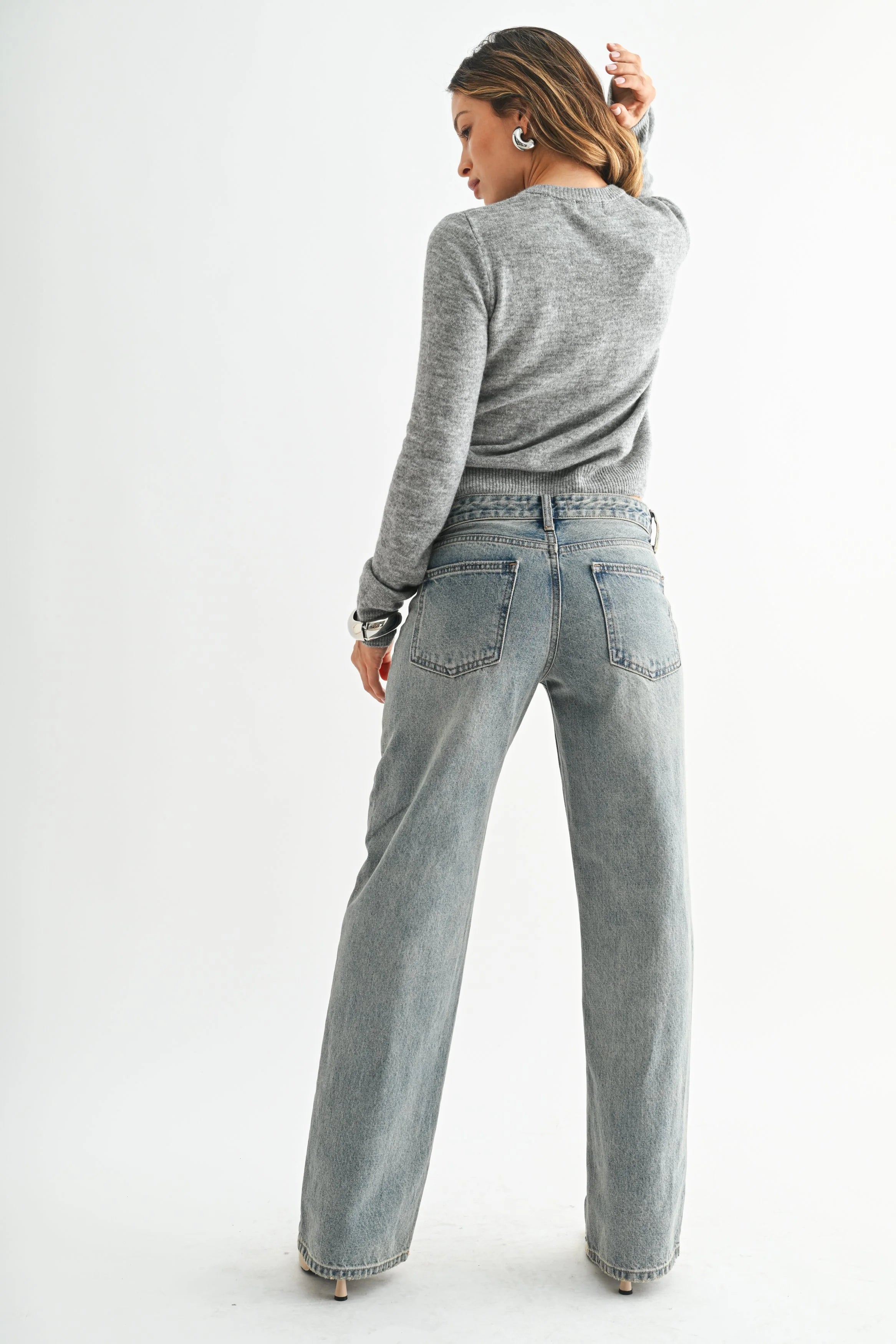 Woman modeling denim.