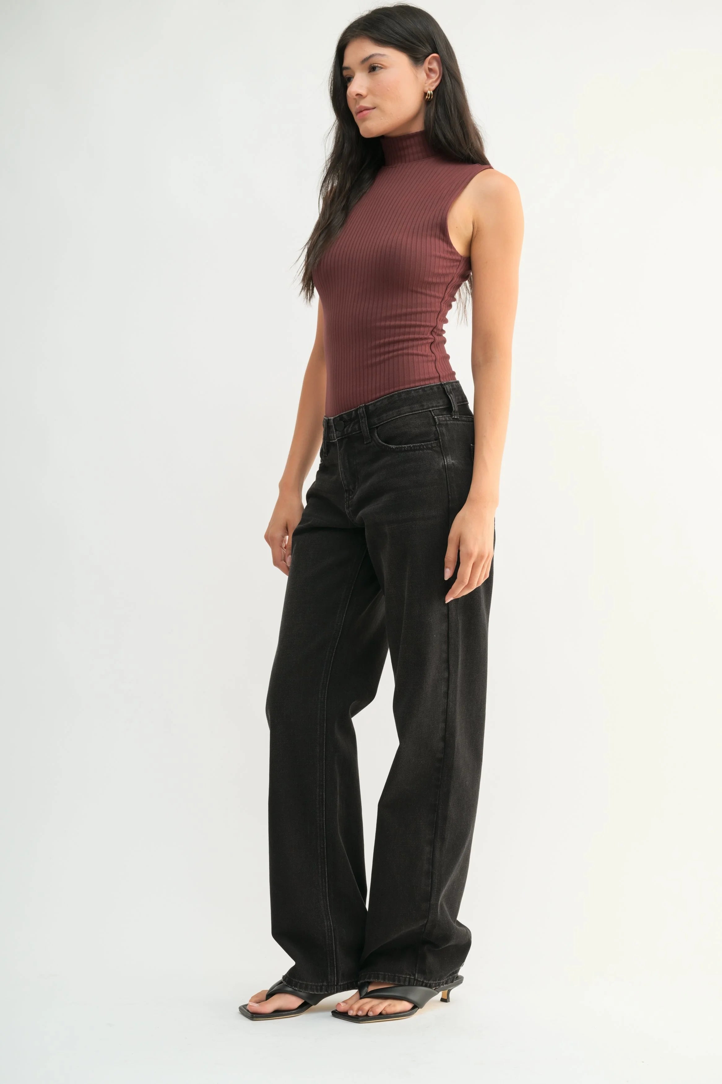 Woman modeling denim.