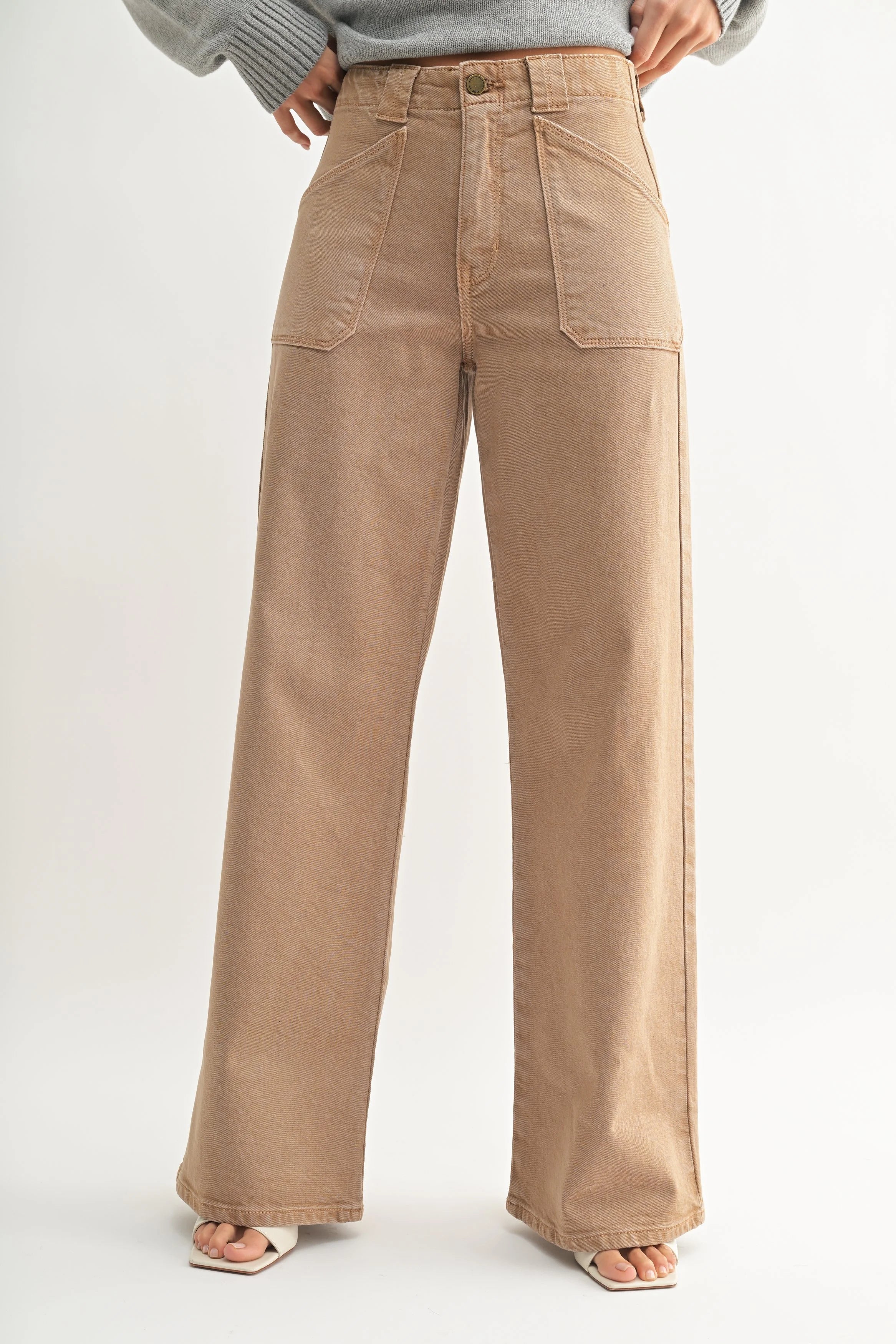 Tan wide-leg pants worn by a person on a white background