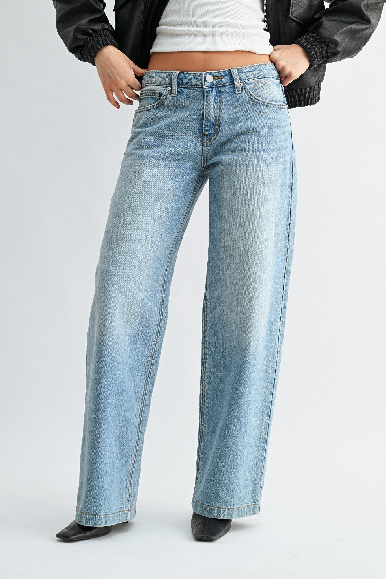 Woman modeling denim jeans. 