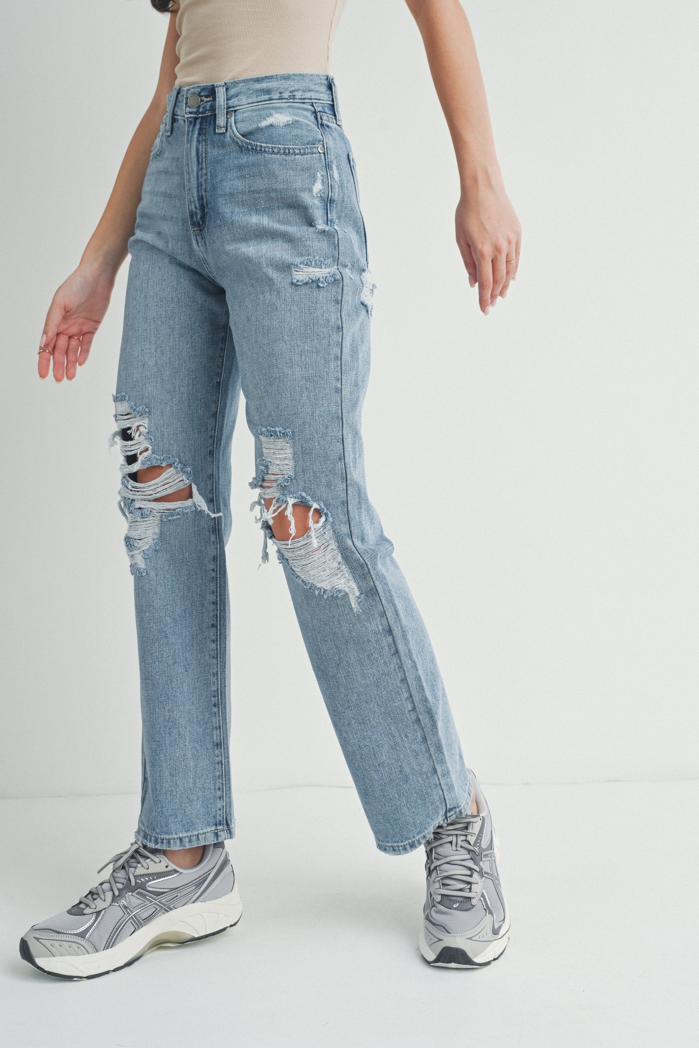 Woman modeling denim.