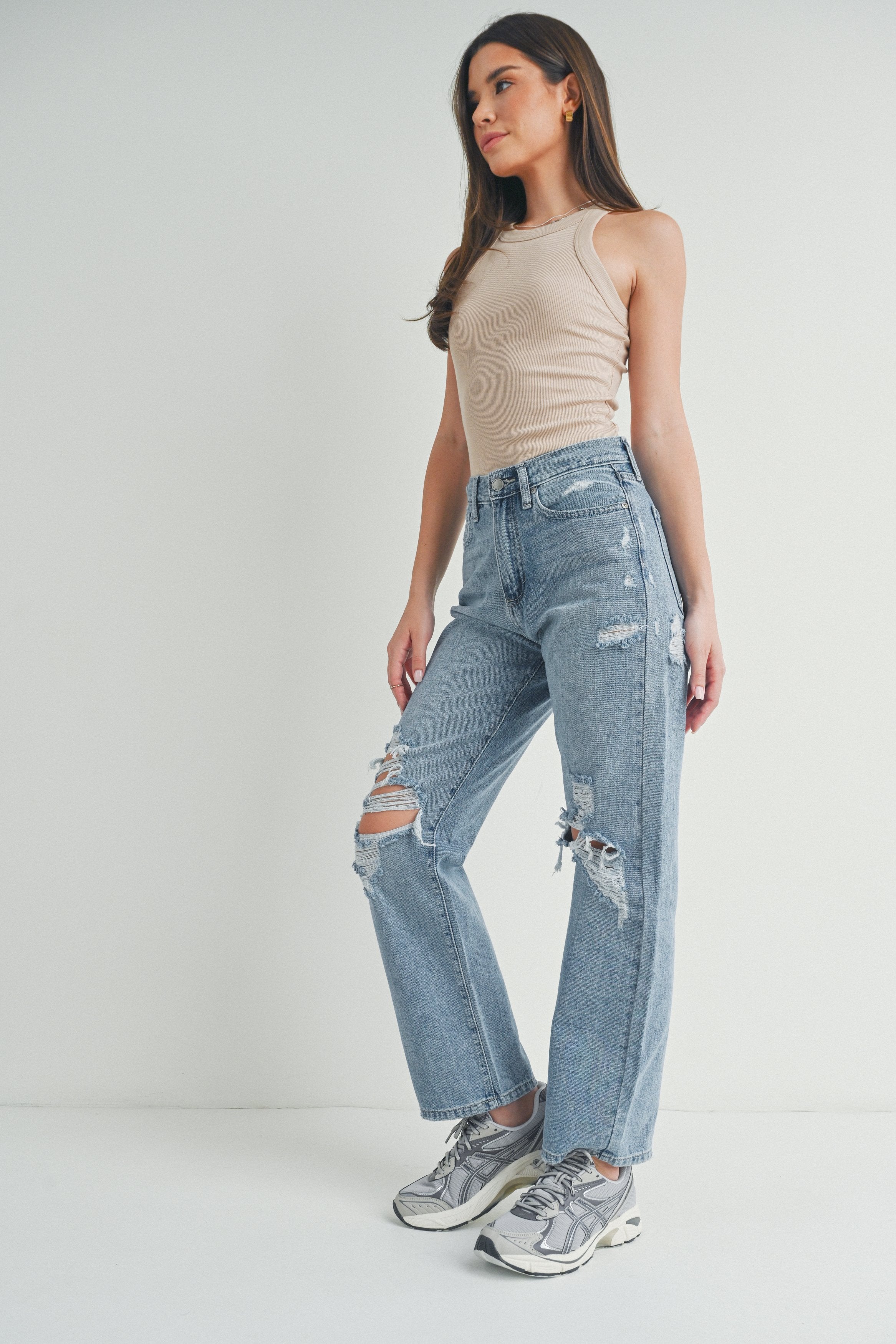 Woman modeling denim.