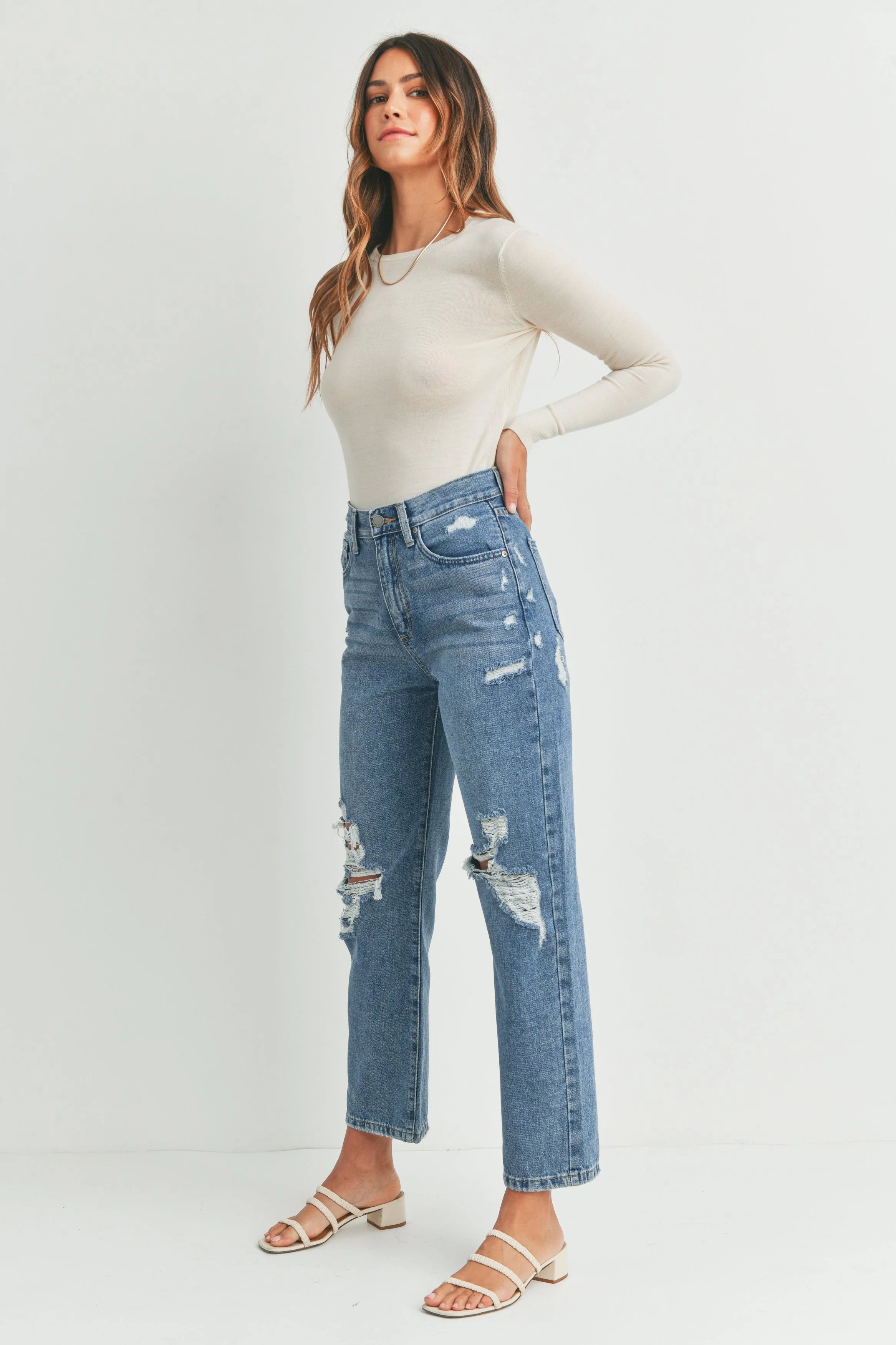 Woman modeling denim.