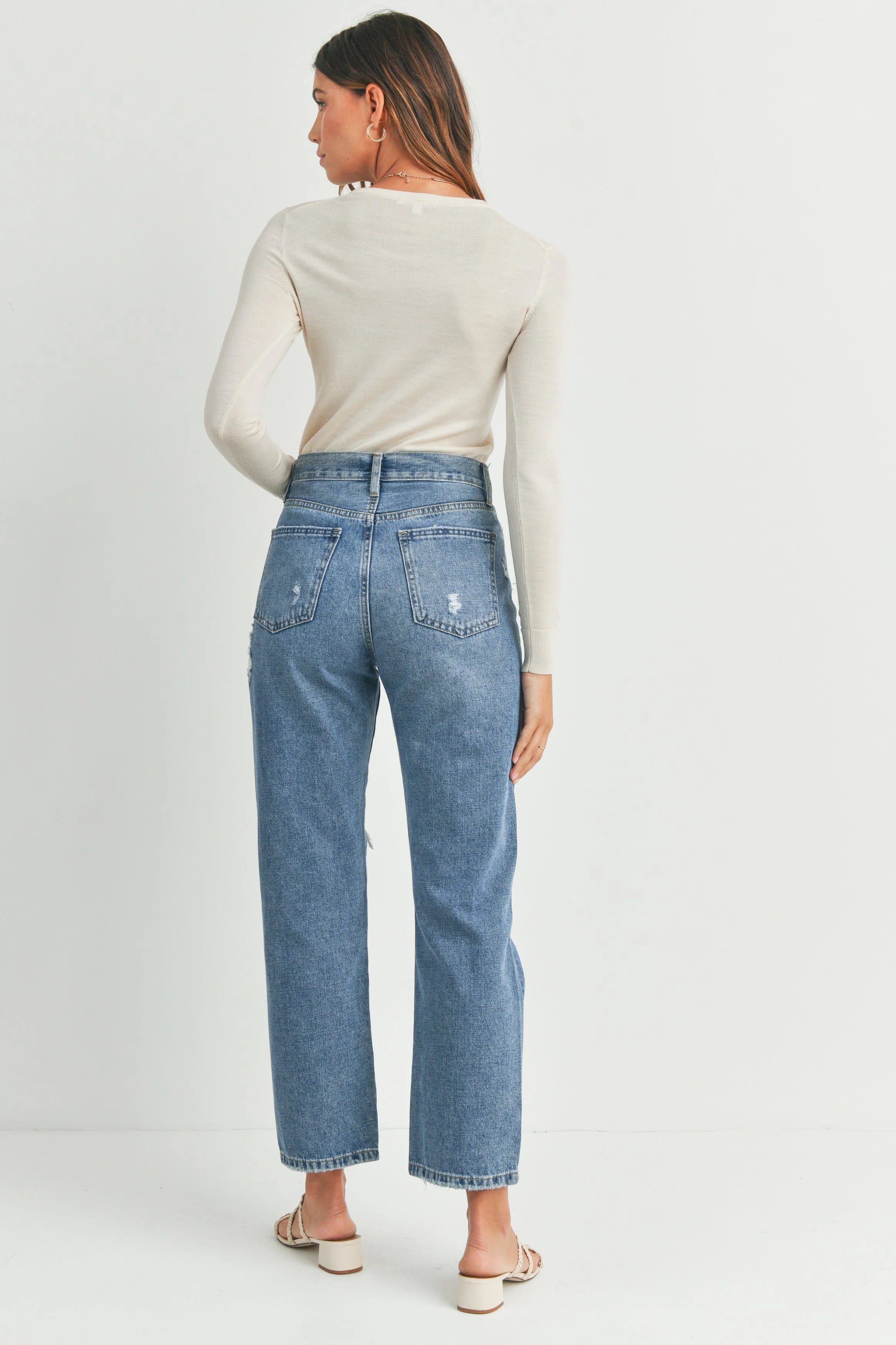 Woman modeling denim.