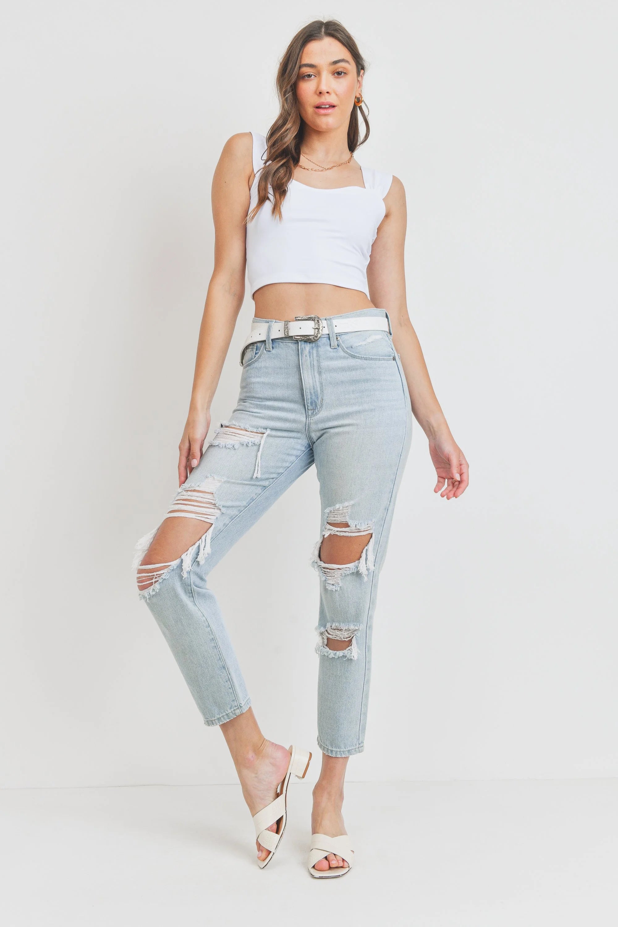 Woman modeling denim.