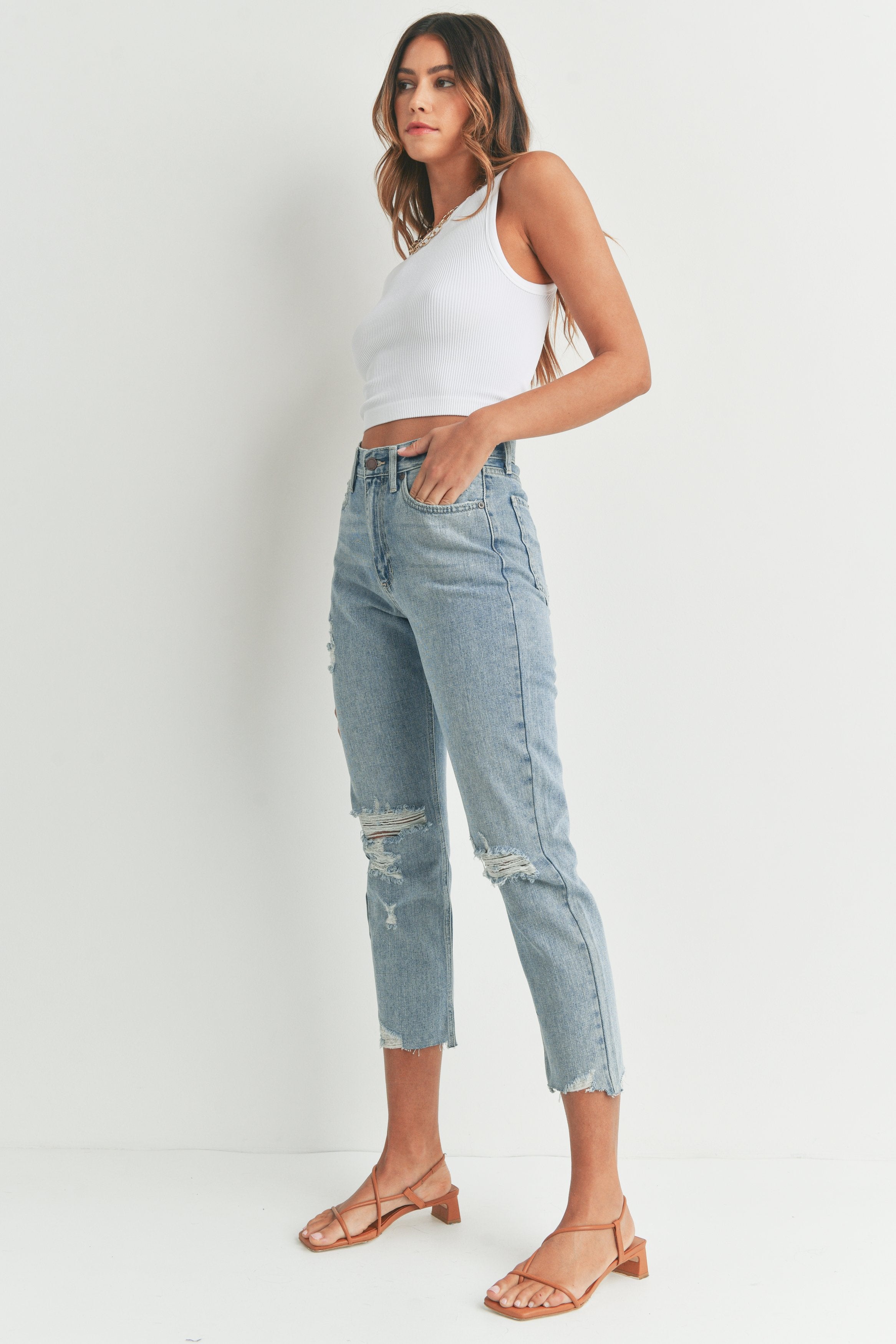 Woman modeling denim.