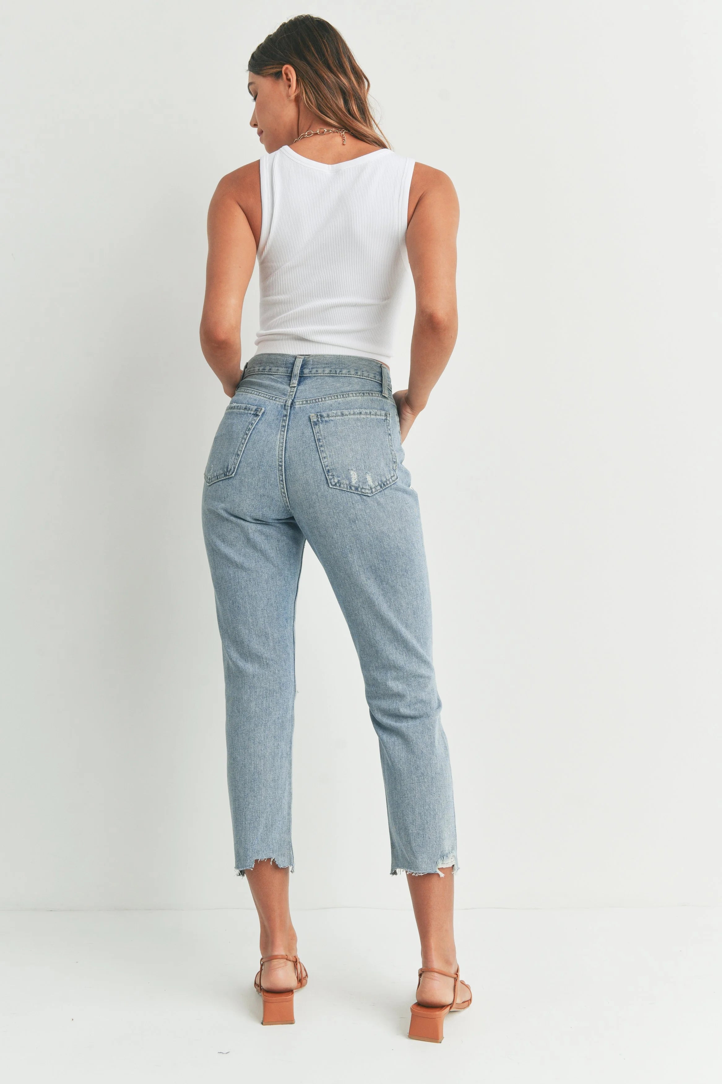 Woman modeling denim.