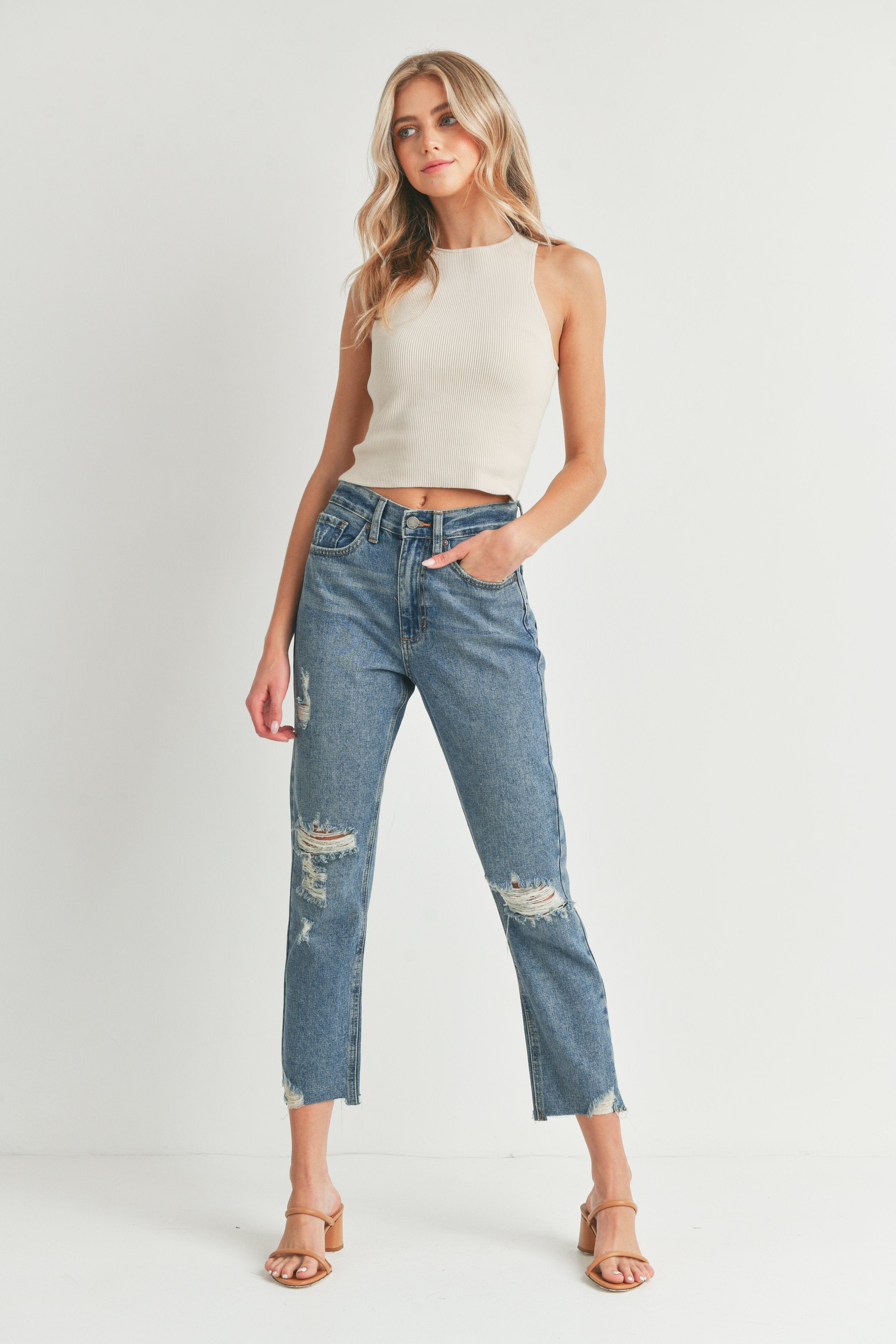 Woman modeling denim.