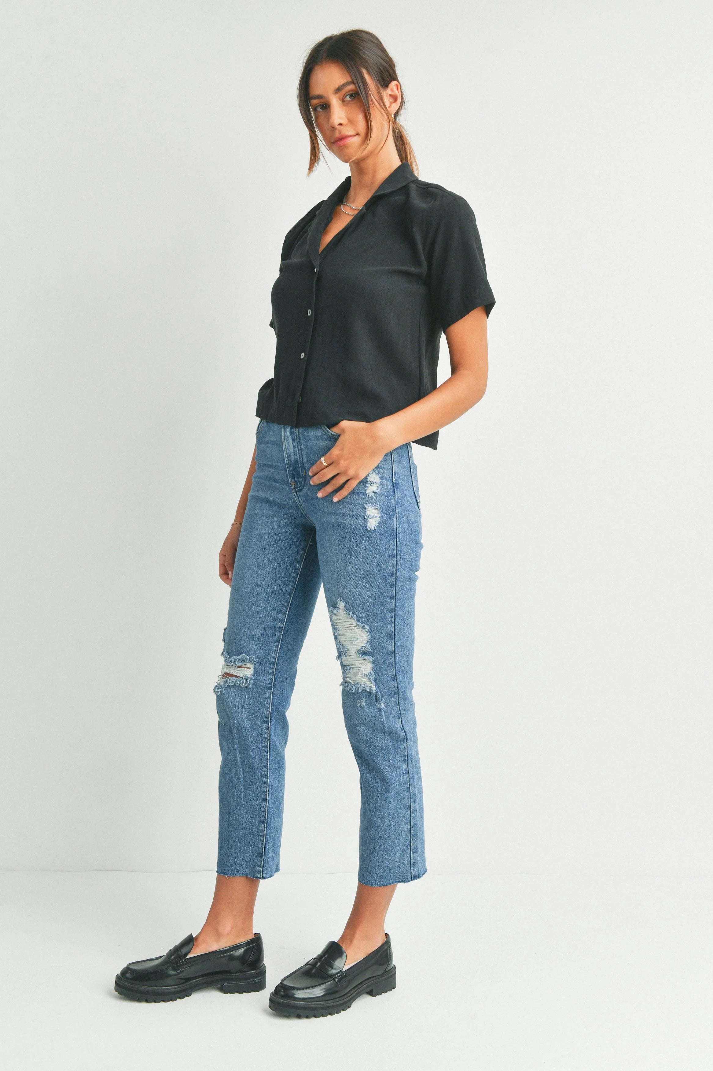 Woman modeling denim.
