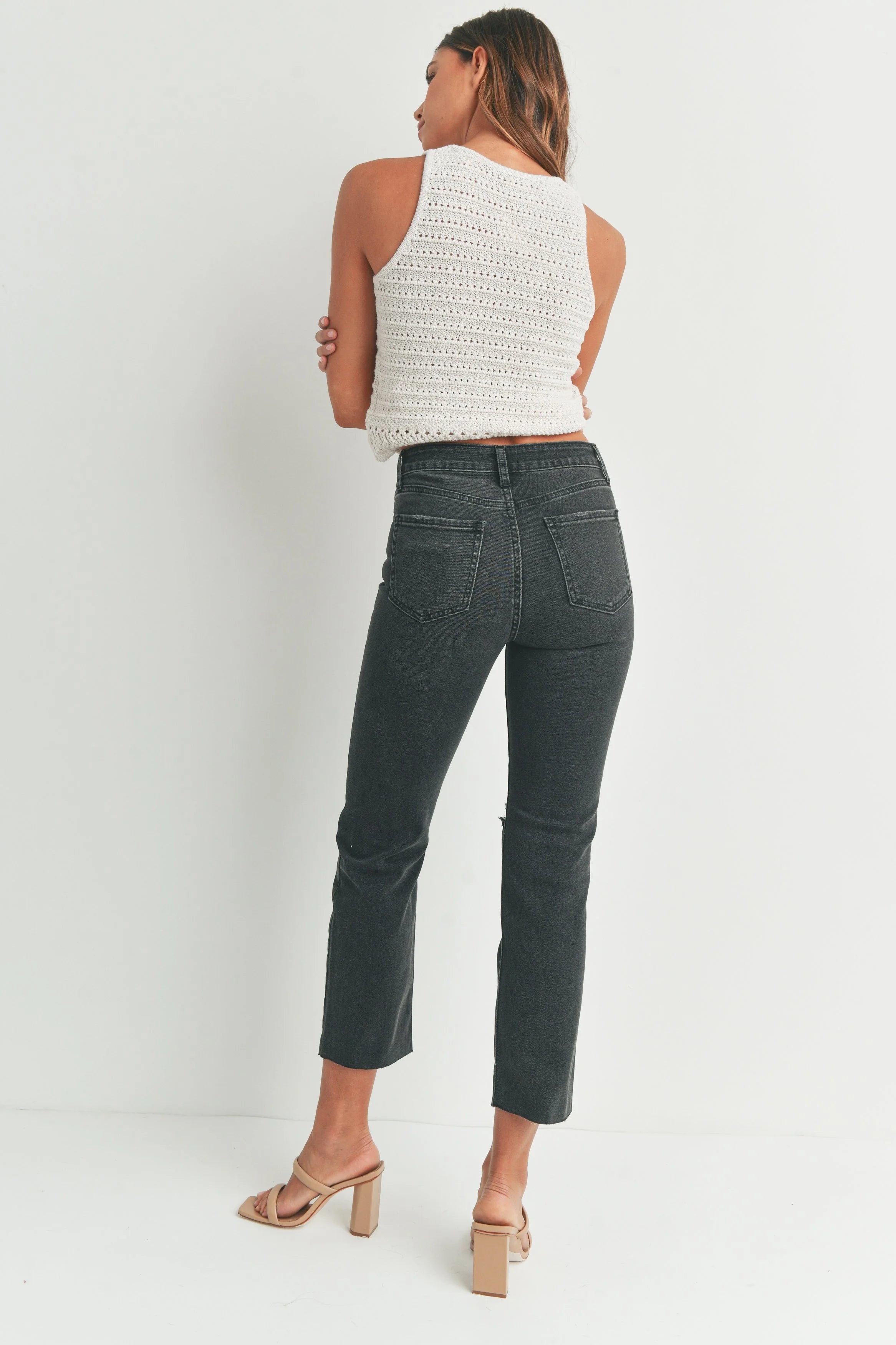 Woman modeling denim.