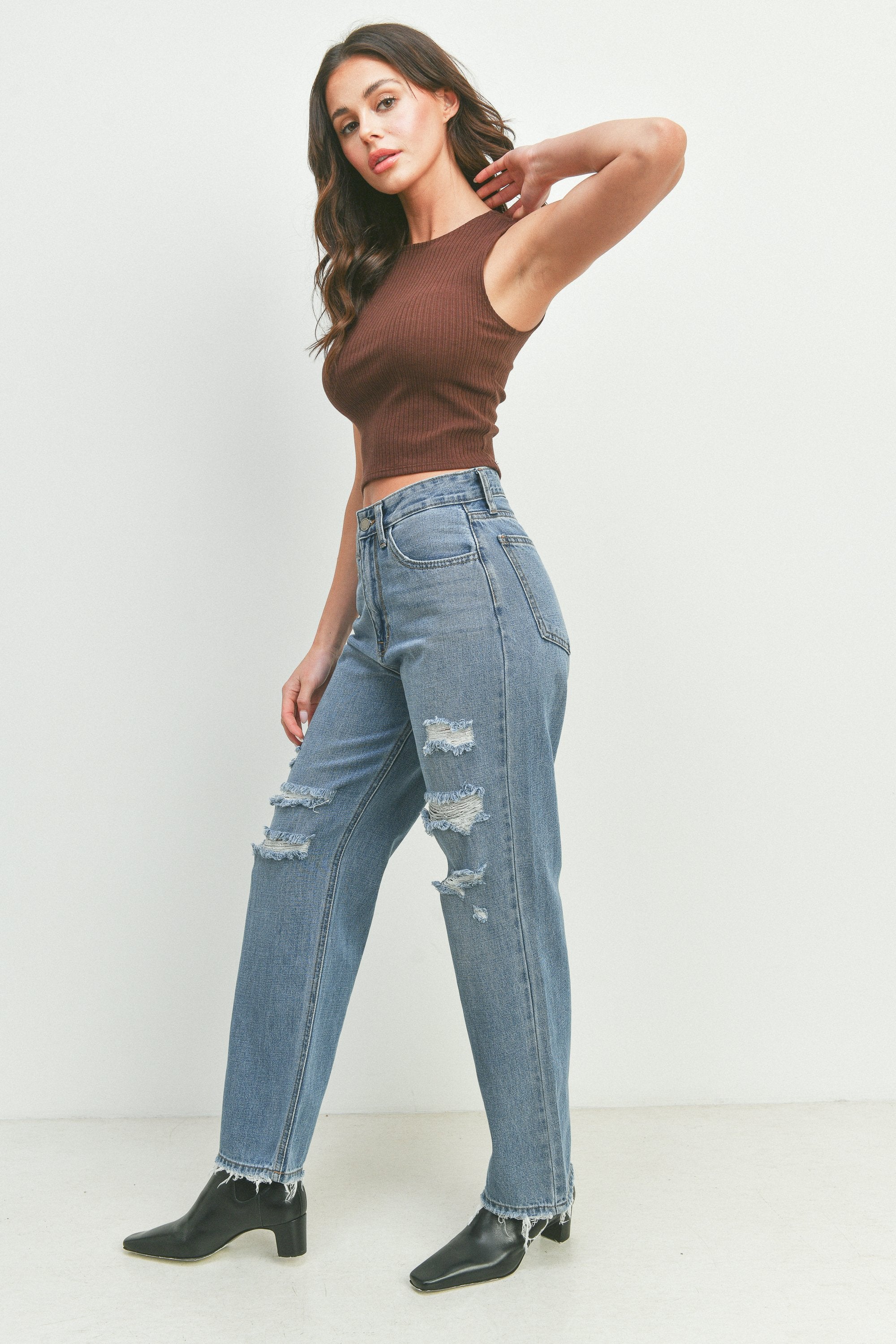 Woman modeling denim.