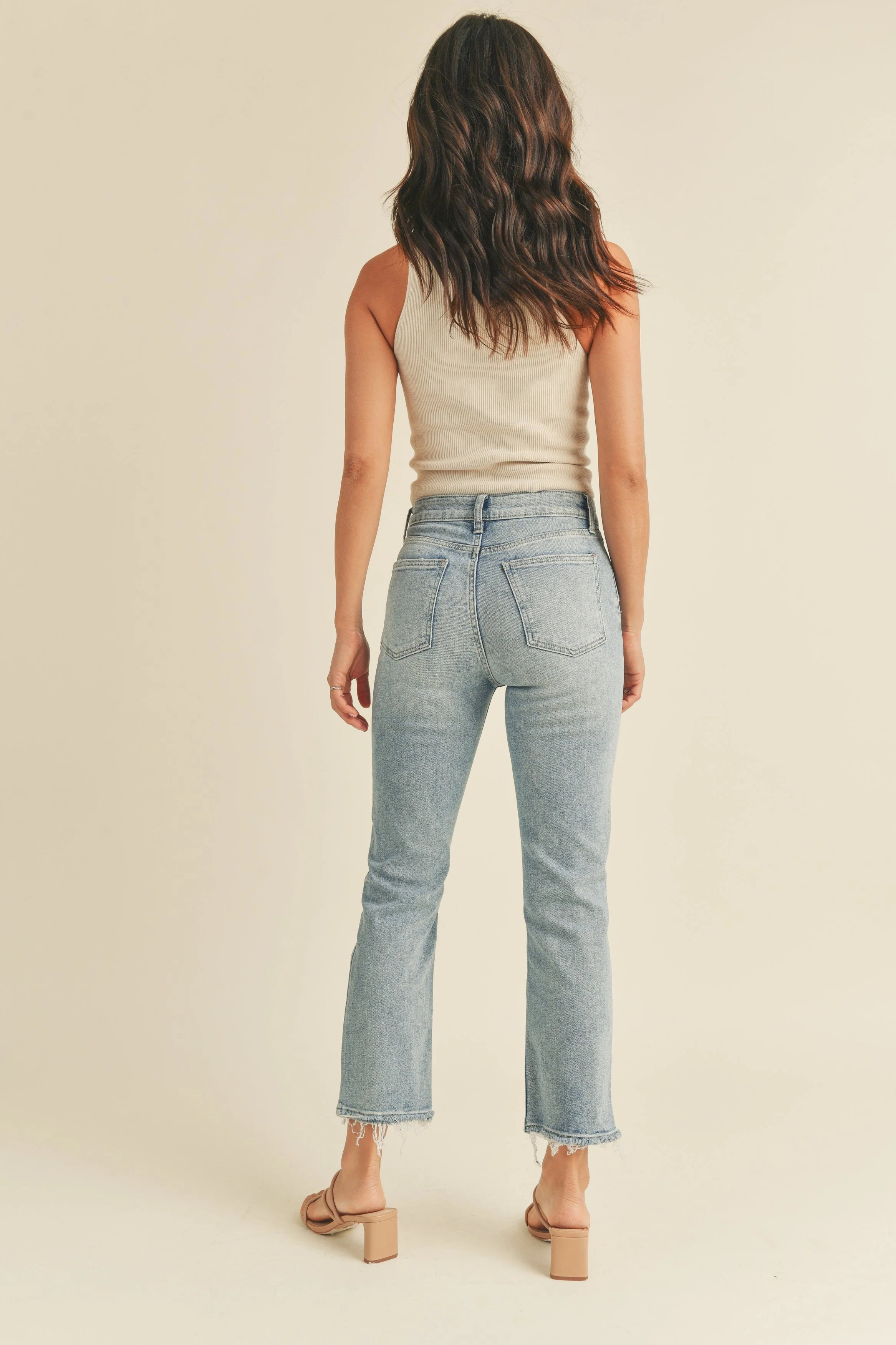 Woman modeling denim.