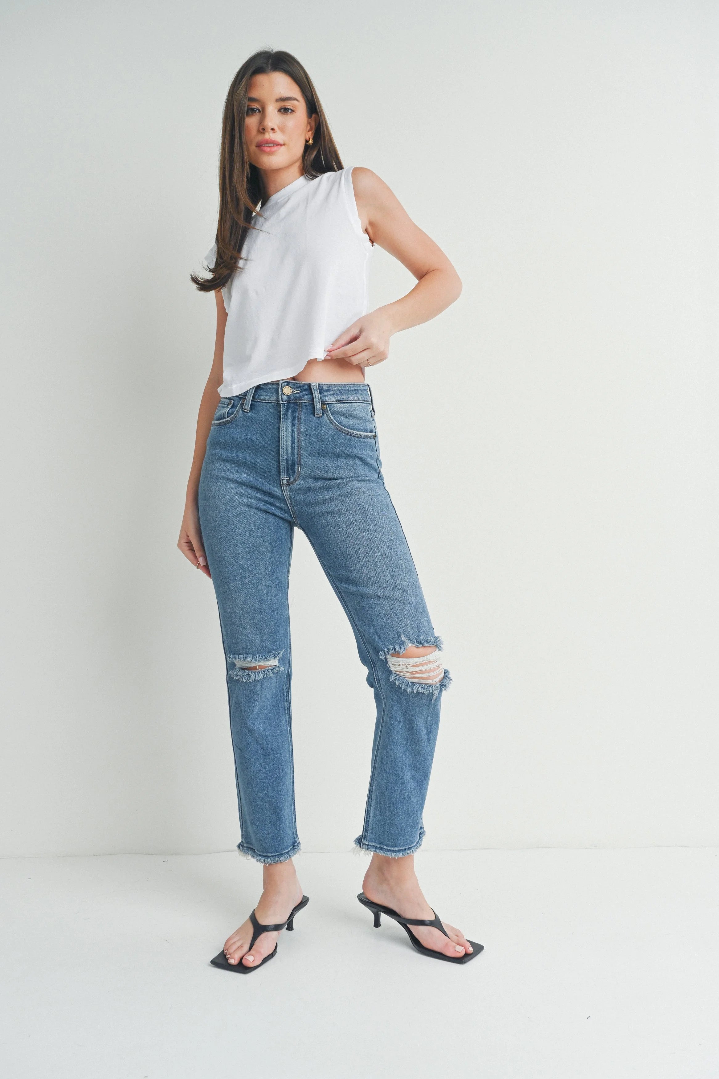Woman modeling denim.