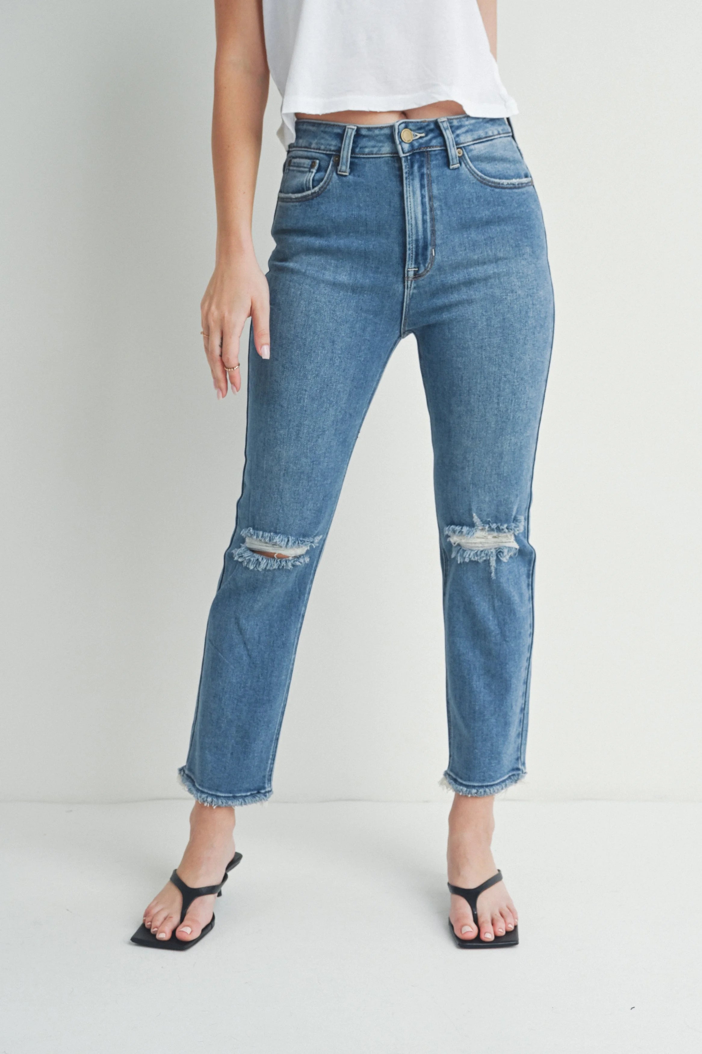 Woman modeling denim.