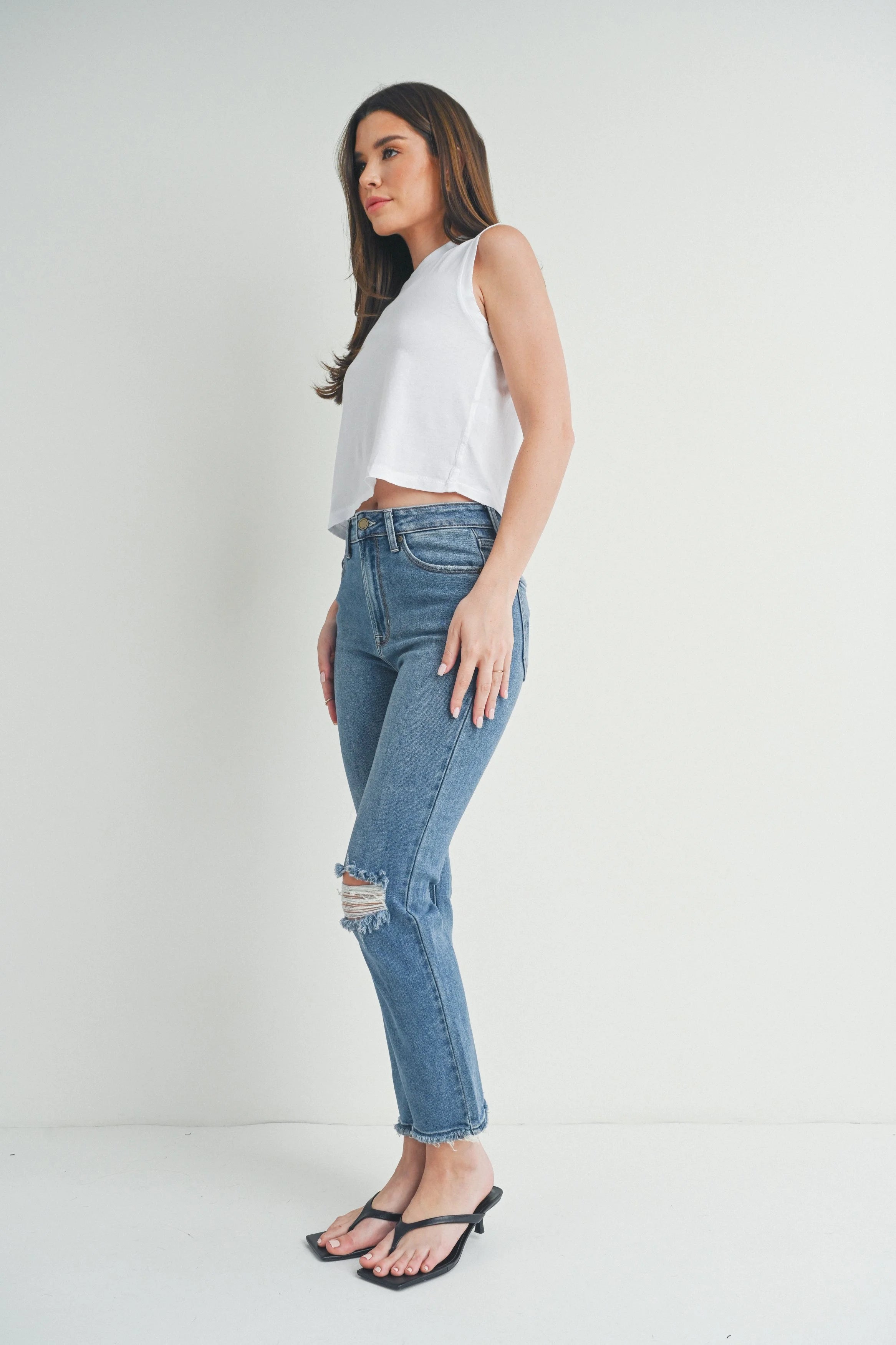 Woman modeling denim.