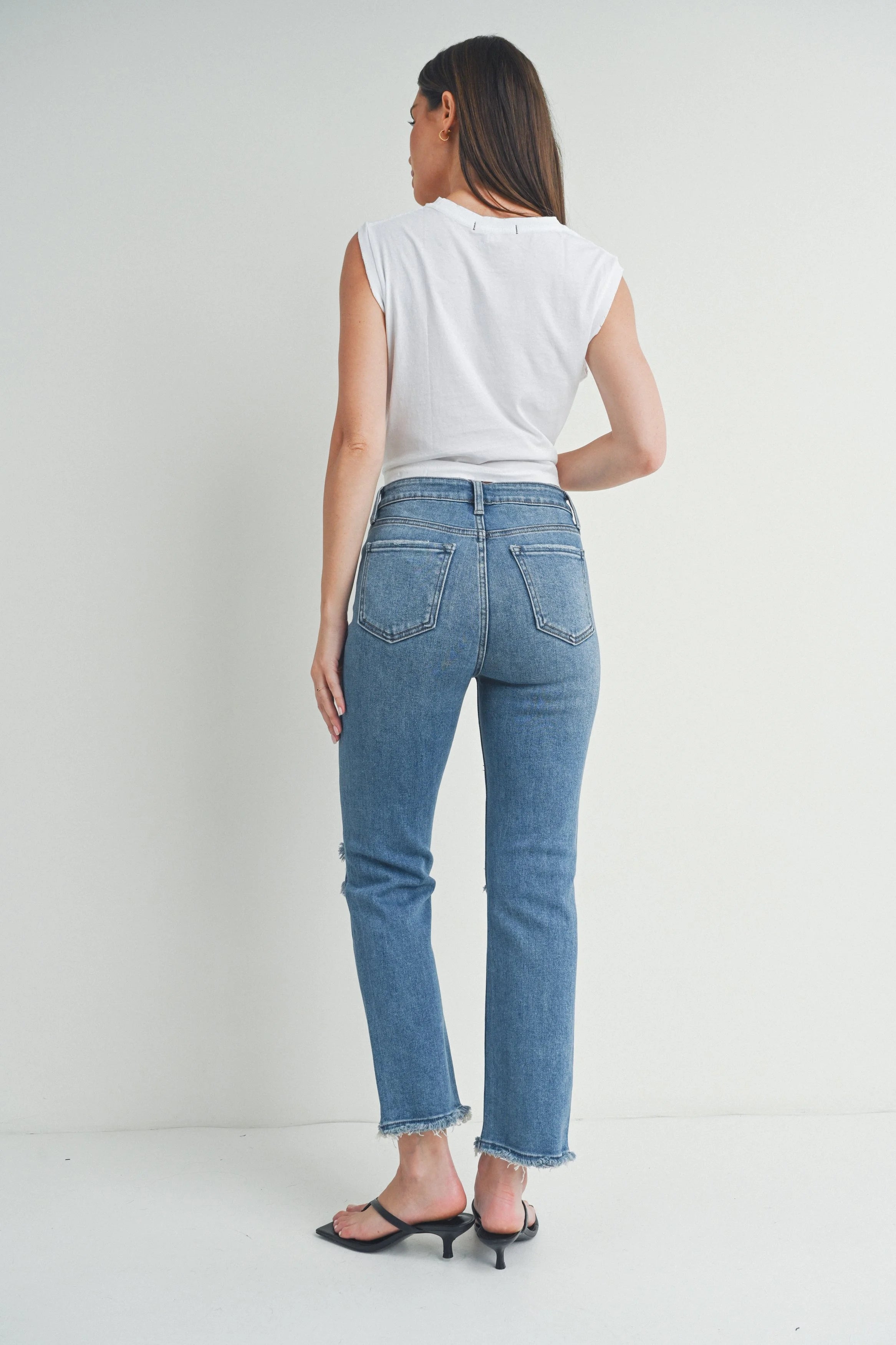 Woman modeling denim.