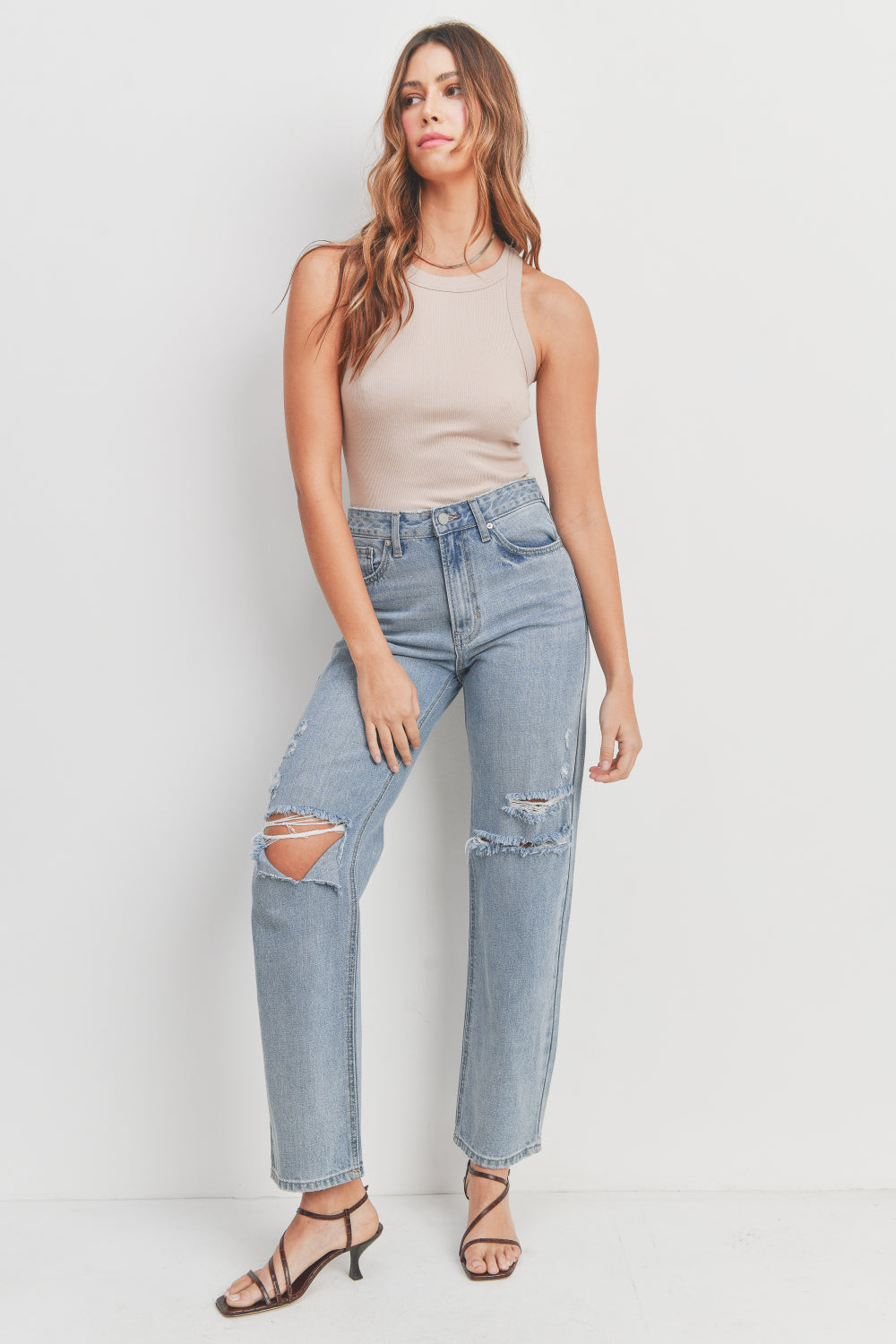 Woman modeling denim.