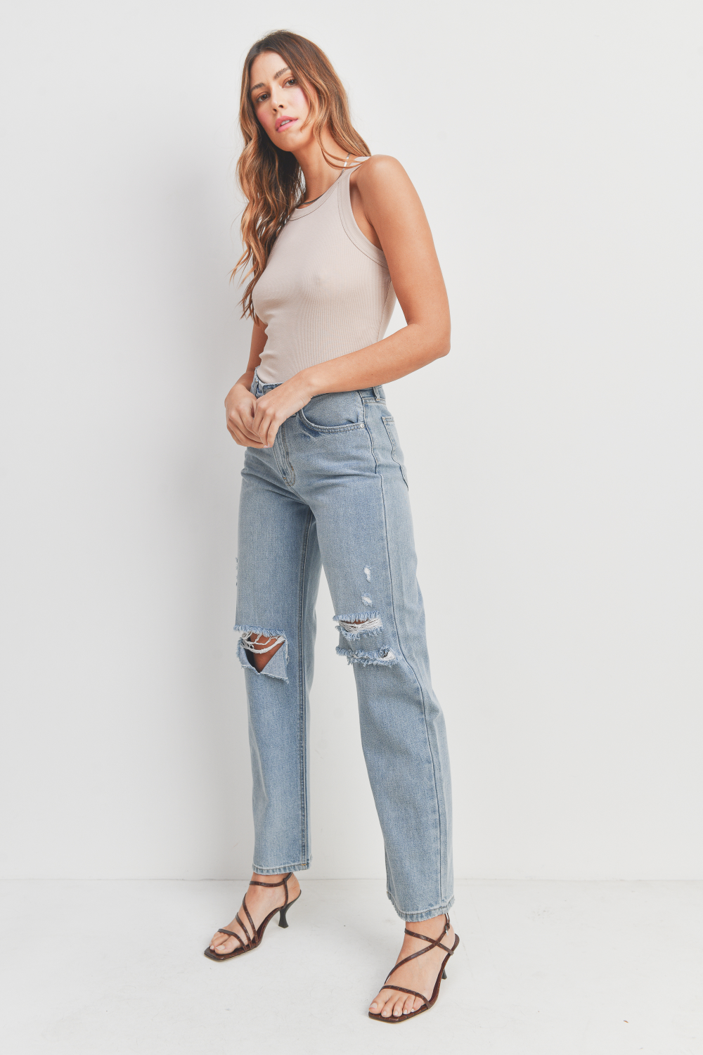 Woman modeling denim.