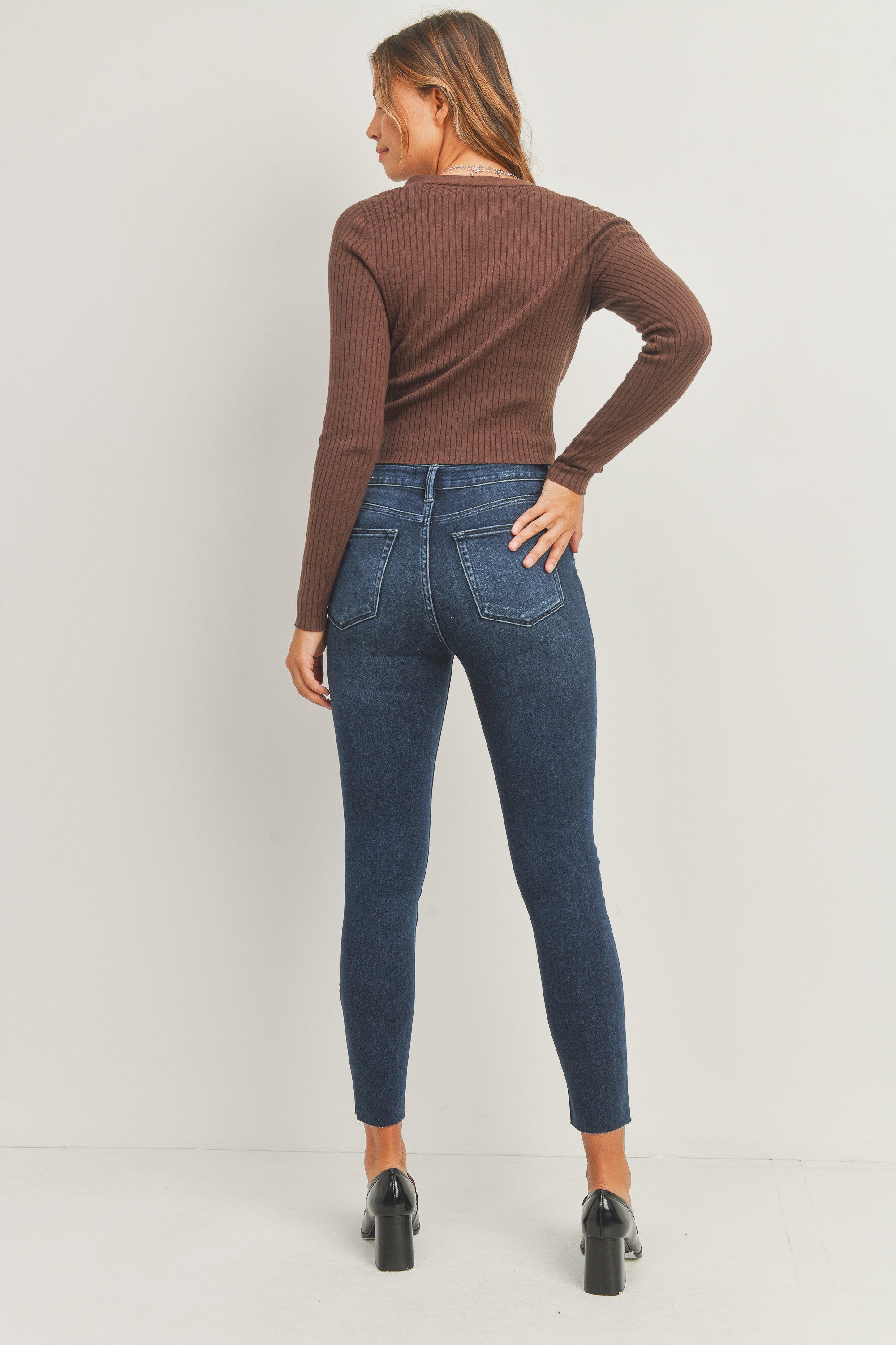Woman modeling denim.