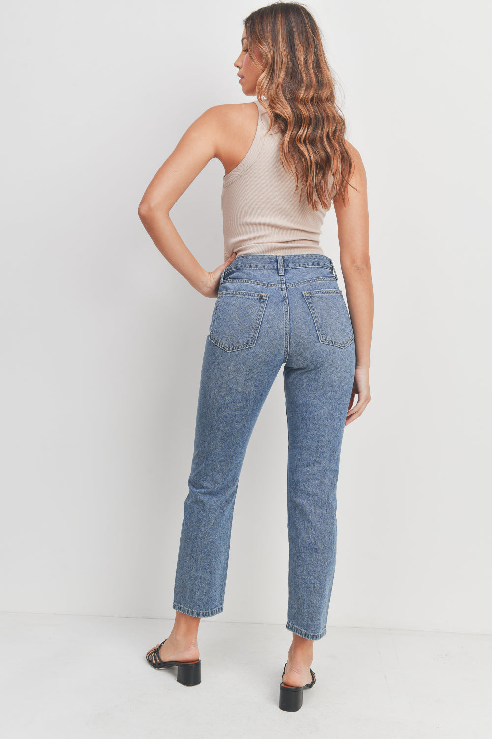 Woman modeling denim.