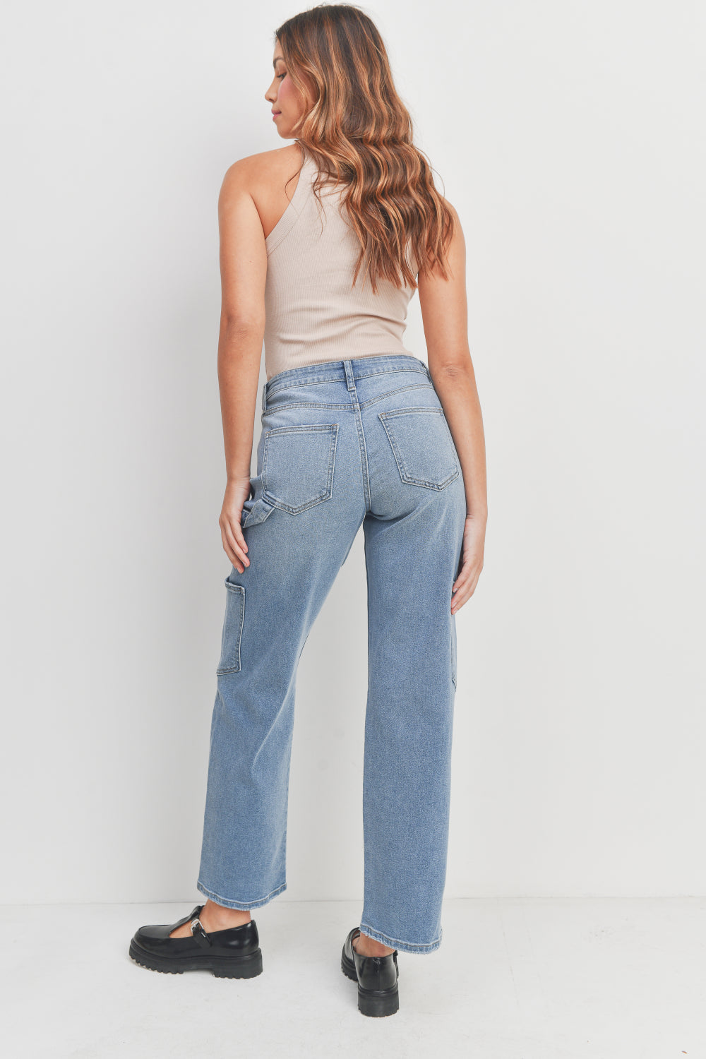 Woman modeling denim.